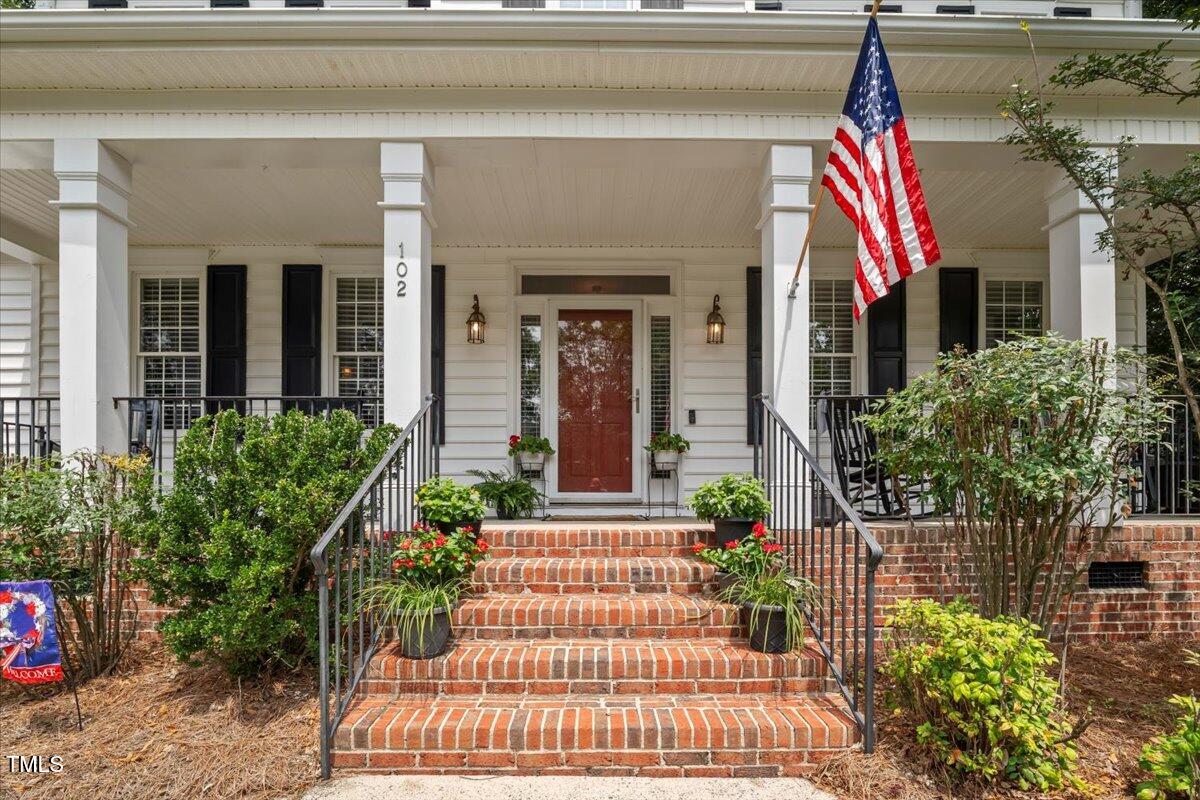 102 Barometer Lane Cary, NC 27513 - Photo 2 of 44 a front view of a house with a porch
