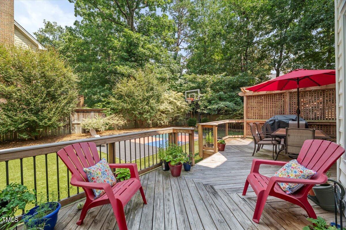 102 Barometer Lane Cary, NC 27513 - Photo 31 of 44 a view of a deck with wooden floor and outdoor seating