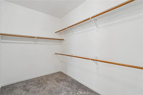 a view of an empty walk in closet