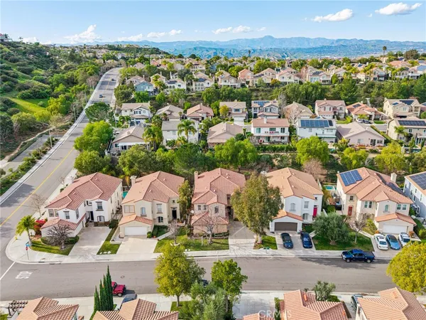 an aerial view of residential building and trees