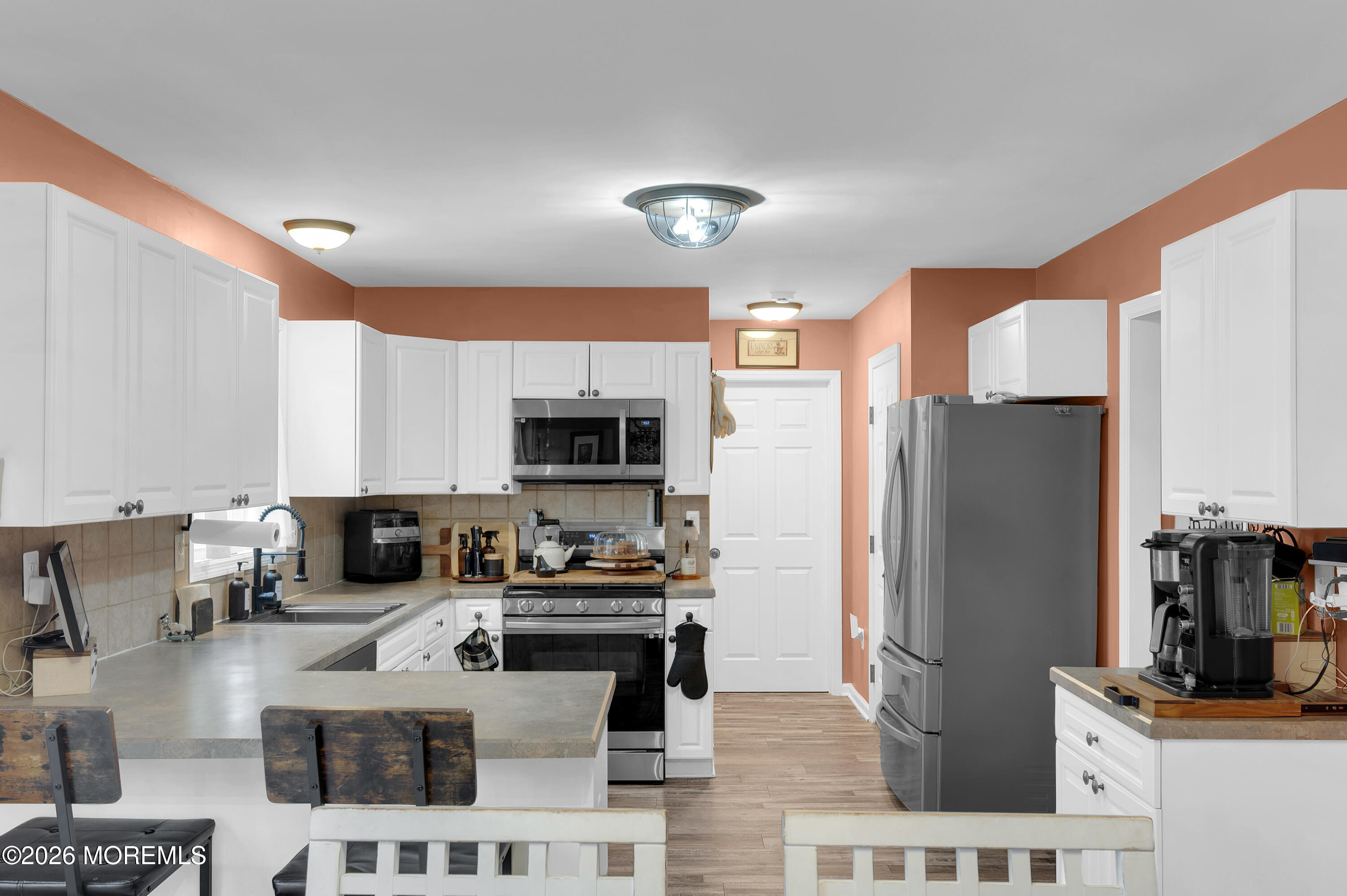 321 Letts Avenue Forked River, NJ 08731 - Photo 2 of 38 a kitchen with stainless steel appliances a refrigerator sink and microwave