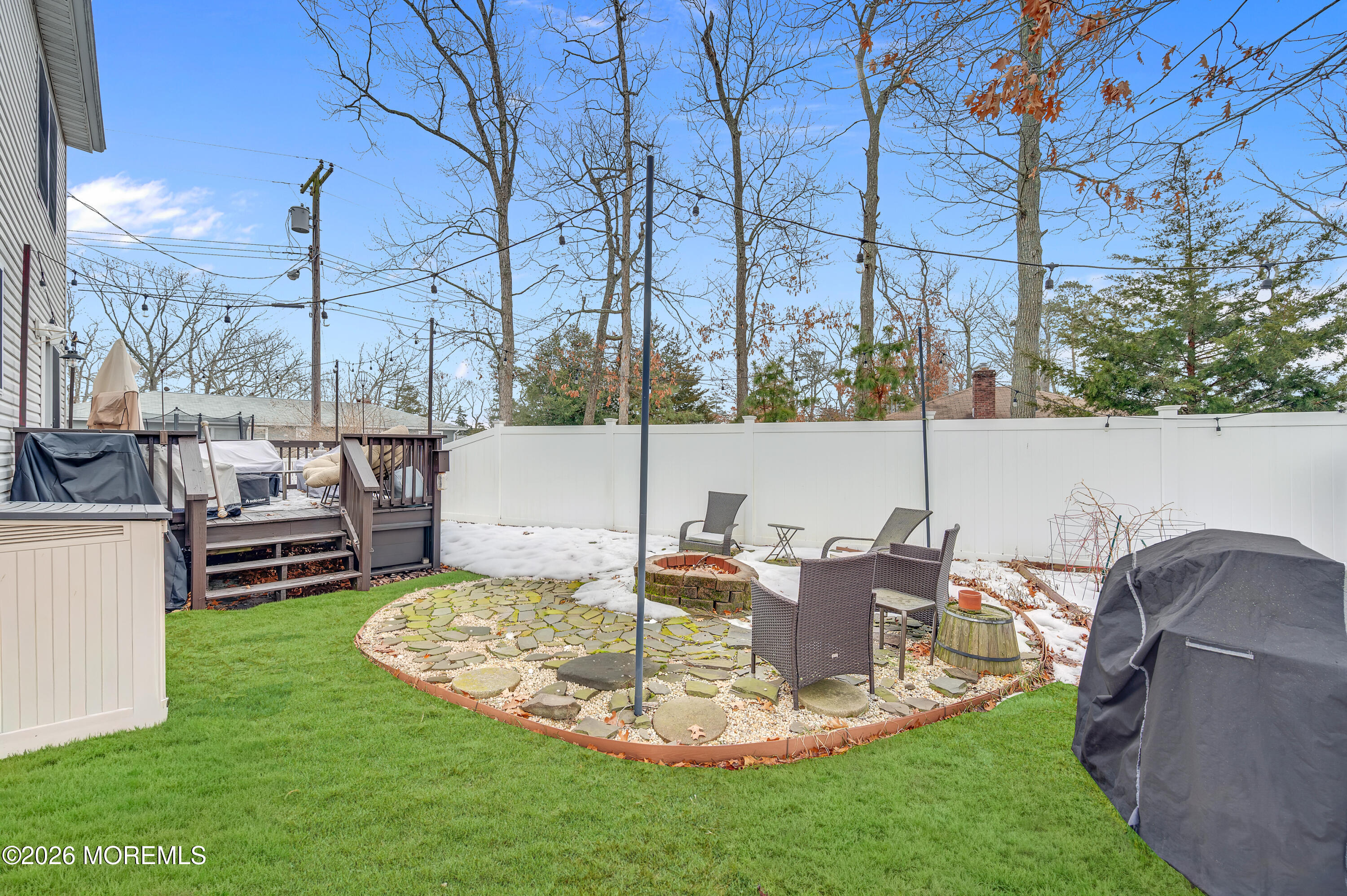321 Letts Avenue Forked River, NJ 08731 - Photo 21 of 38 a view of a table and chairs in the patio