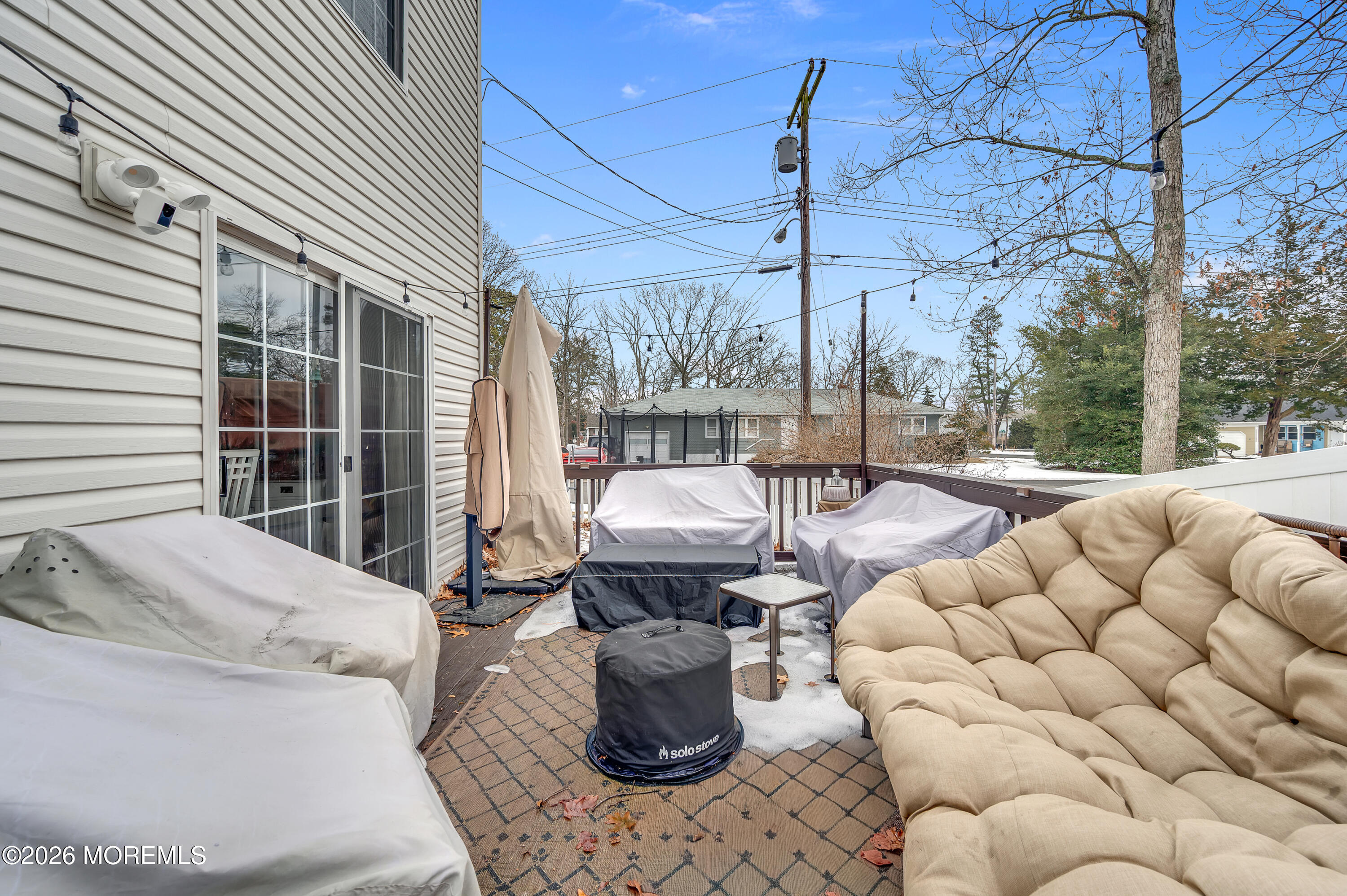 321 Letts Avenue Forked River, NJ 08731 - Photo 25 of 38 a view of the patio with couches chairs and a potted plant