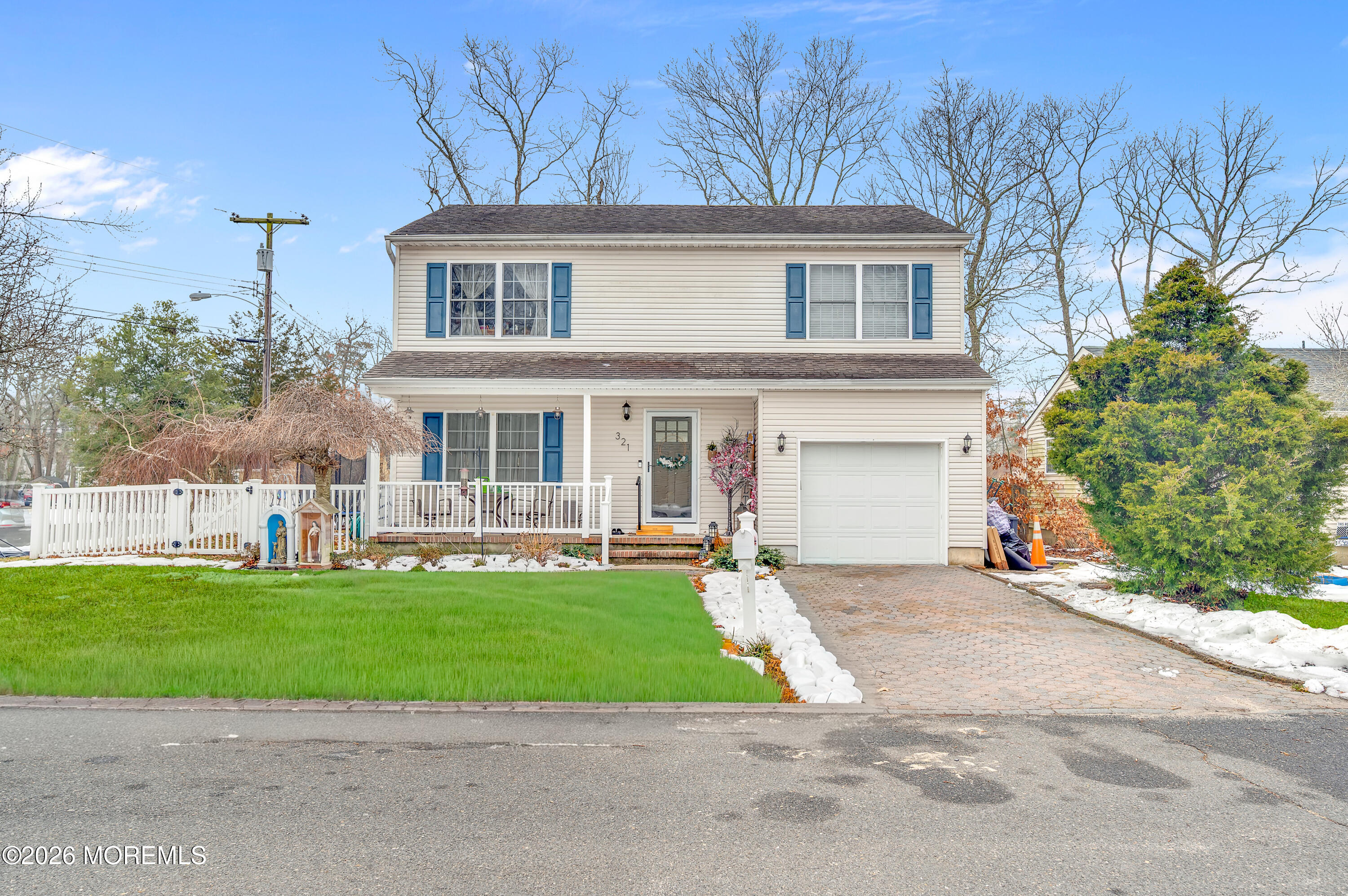 321 Letts Avenue Forked River, NJ 08731 - Photo 26 of 38 a front view of a house with a garden and yard