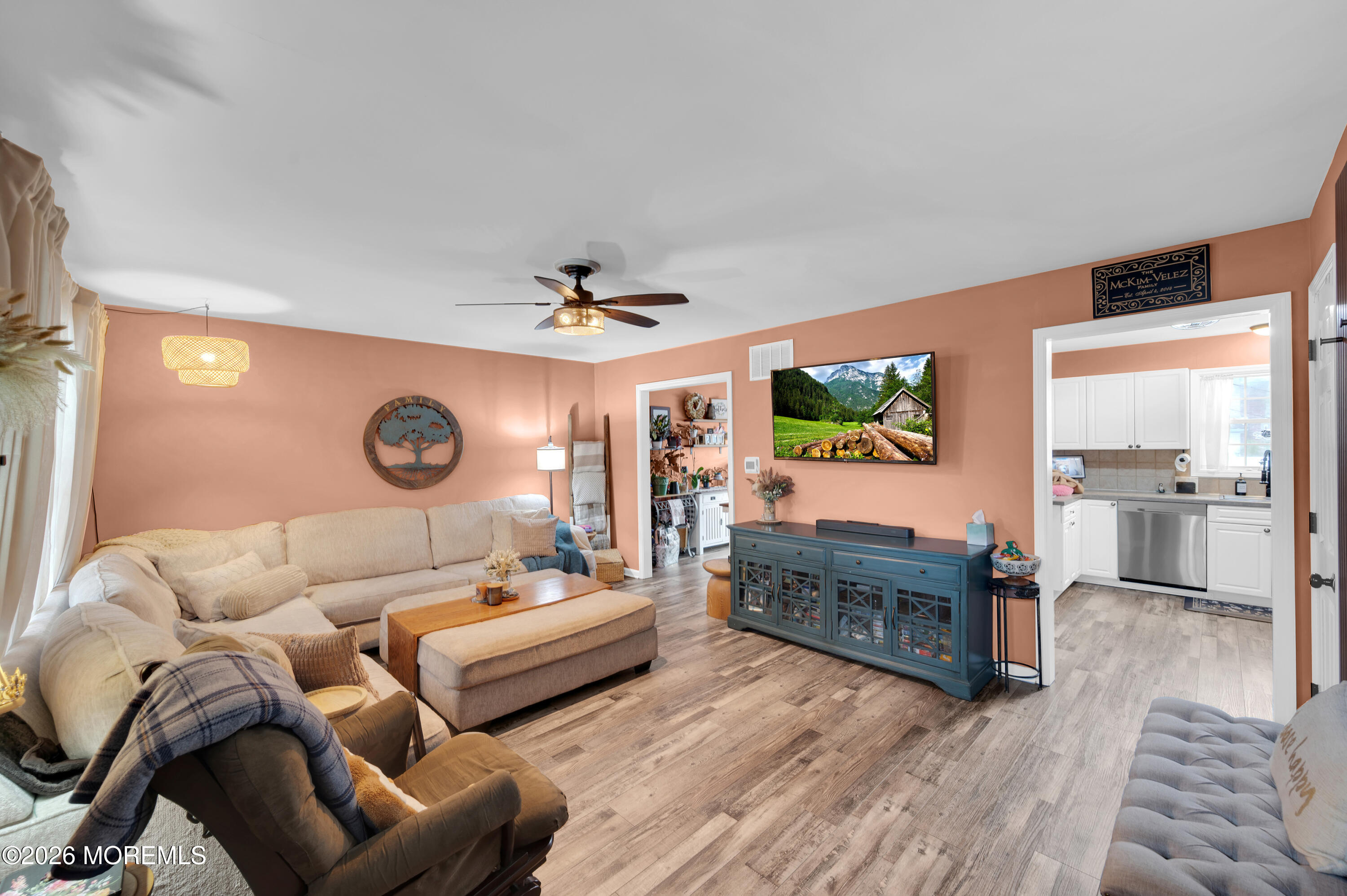 321 Letts Avenue Forked River, NJ 08731 - Photo 31 of 38 a living room with furniture and a flat screen tv