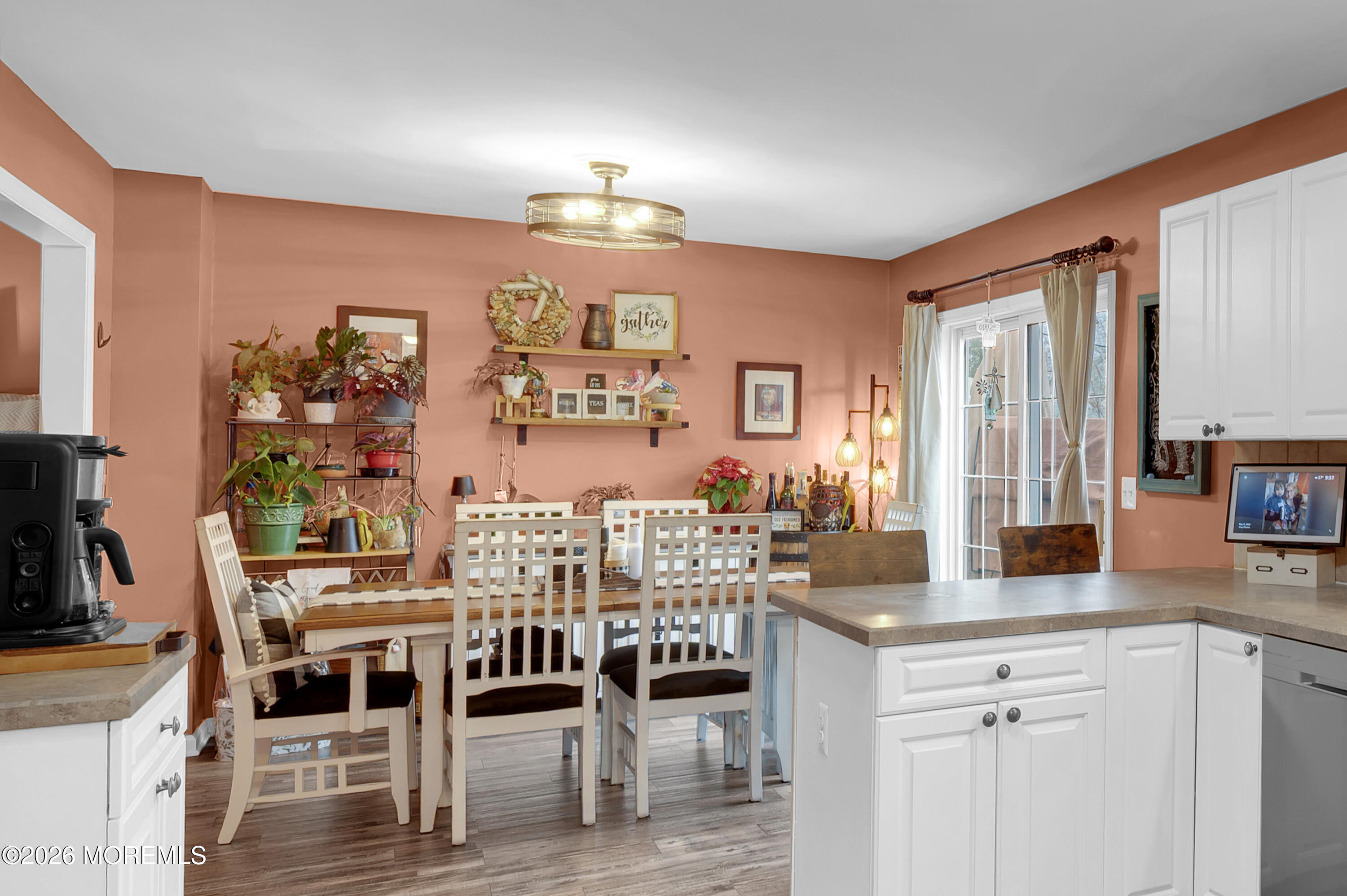 321 Letts Avenue Forked River, NJ 08731 - Photo 7 of 38 a view of a dining room with furniture and wooden floor