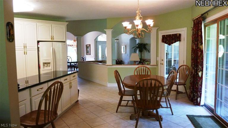 11159 Prouty Road Painesville, OH 44077 - Photo 8 of 21 View from Kitchen into Living Room and Dining Room
