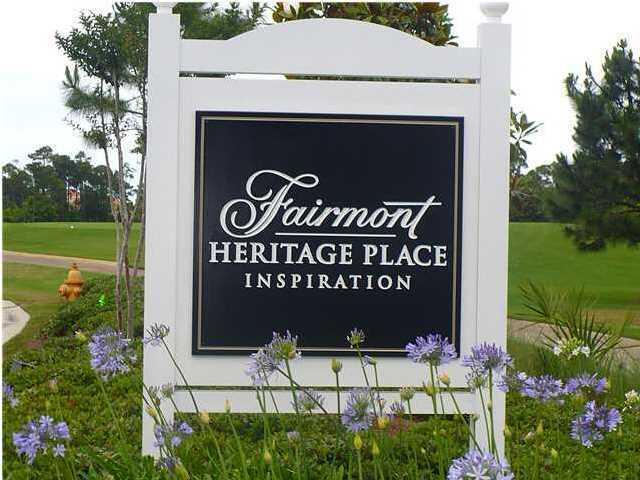 8103 Inspiration Drive, Unit E1 Miramar Beach, FL 32550 - Photo 23 of 42 a sign on the side of the wall