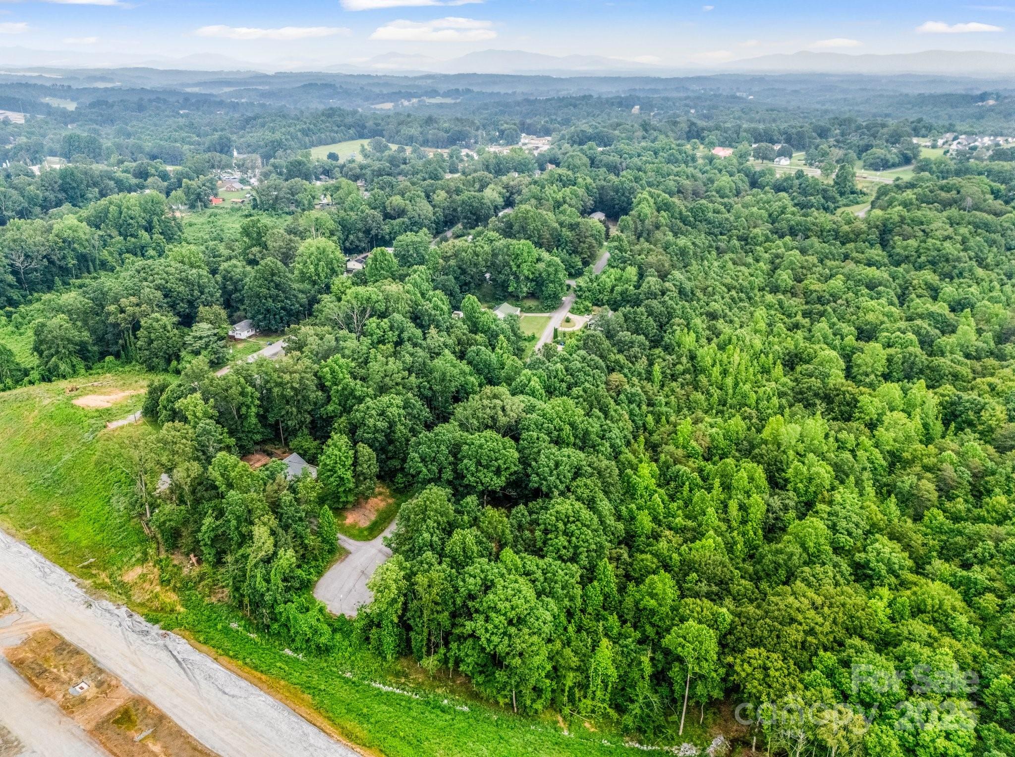 0 Hutchins Drive, Unit 14 15 Rutherfordton, NC 28139 - Photo 6 of 26 a view of a yard with an outdoor space