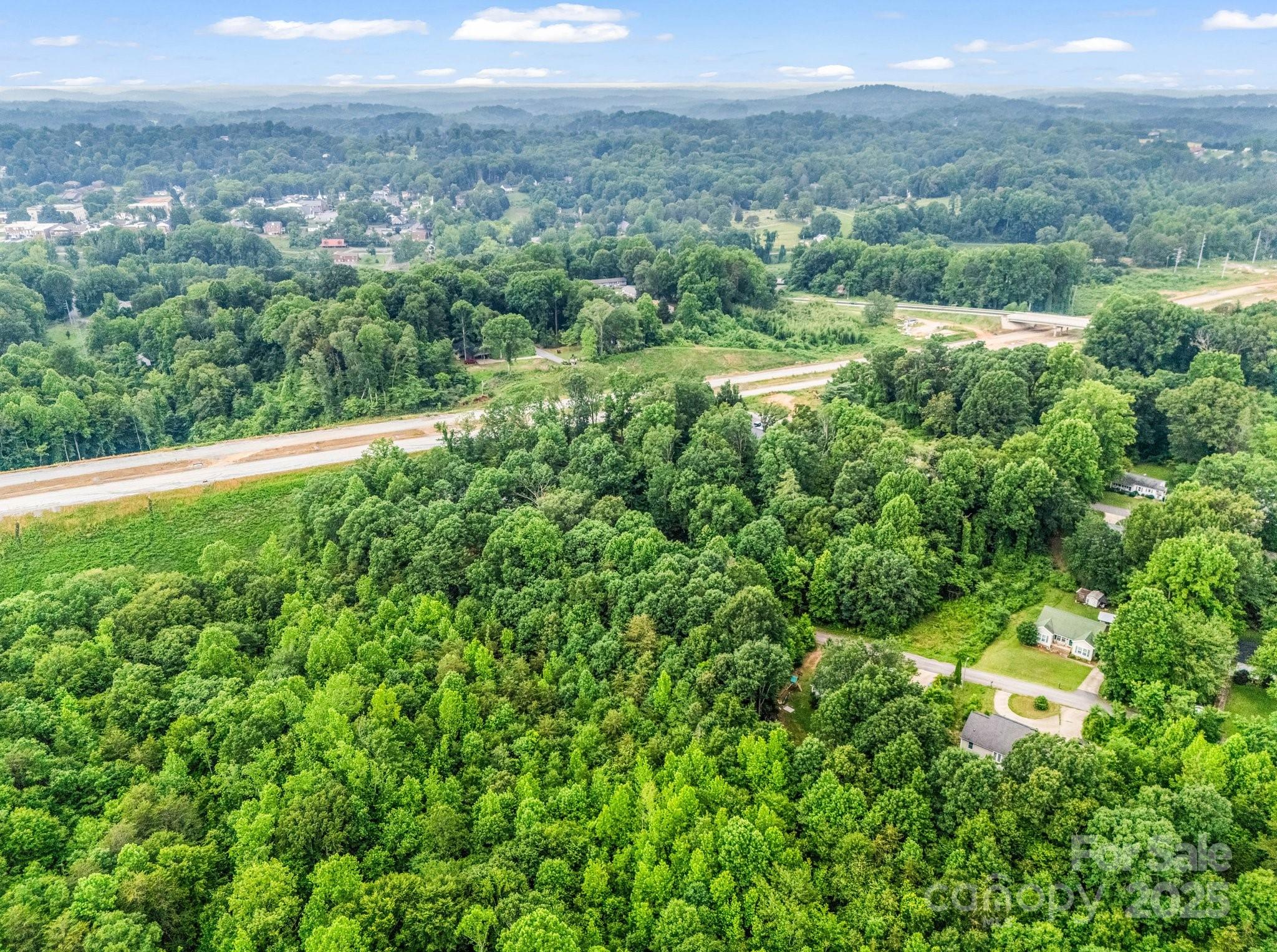 0 Hutchins Drive, Unit 14 15 Rutherfordton, NC 28139 - Photo 9 of 26 a view of a yard with an outdoor space