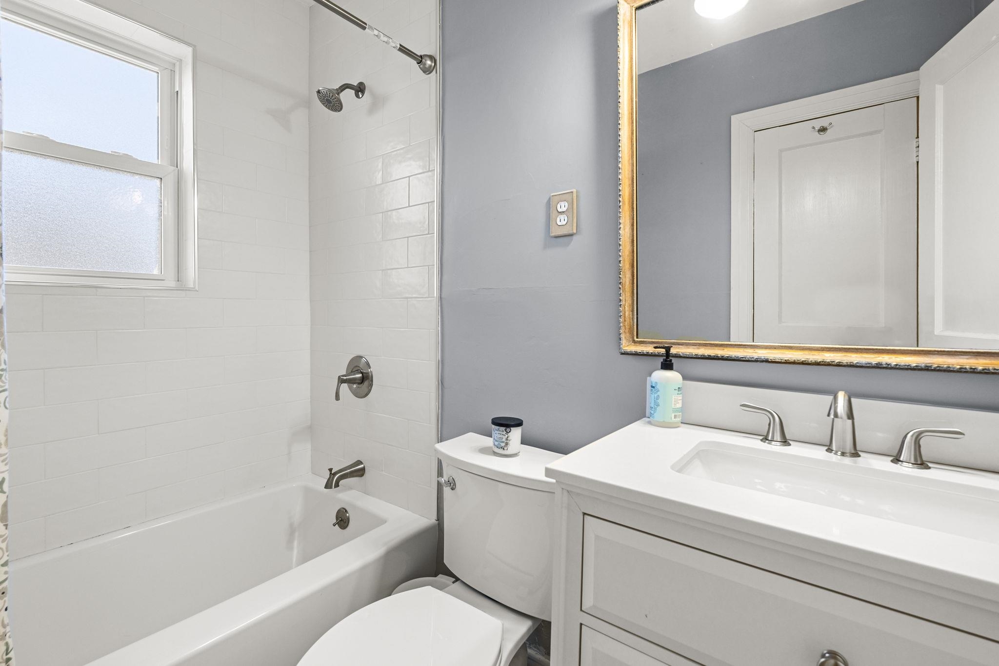 4120 Village Road Memphis, TN 38117 - Photo 19 of 28 Full bathroom featuring vanity and shower / bath combination with curtain