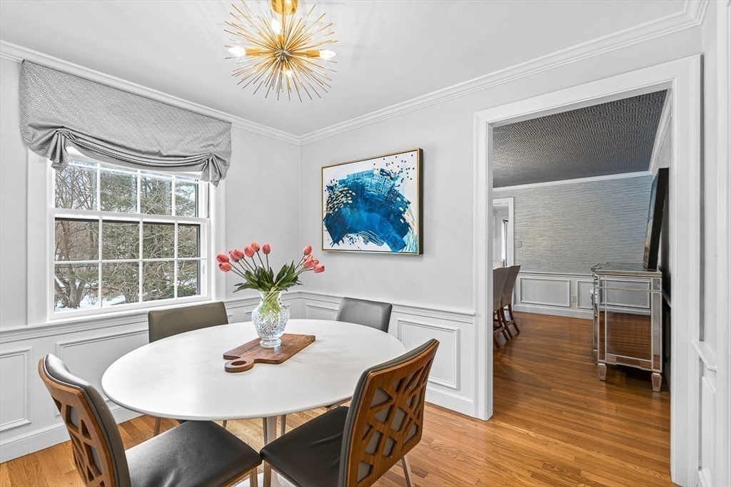 169 Hampshire Road Wellesley, MA 02481 - Photo 16 of 42 a view of a dining room with furniture window and wooden floor