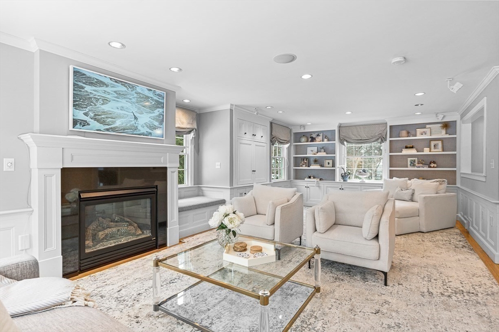 169 Hampshire Road Wellesley, MA 02481 - Photo 20 of 42 a living room with furniture a window and a fireplace