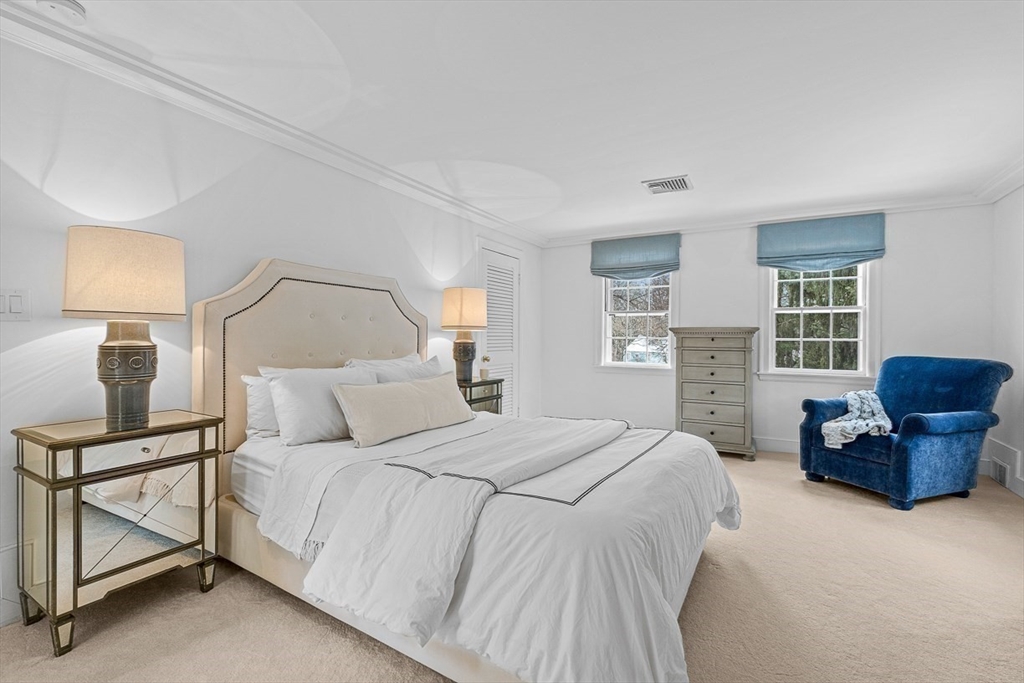 169 Hampshire Road Wellesley, MA 02481 - Photo 25 of 42 a bedroom with a bed and furniture