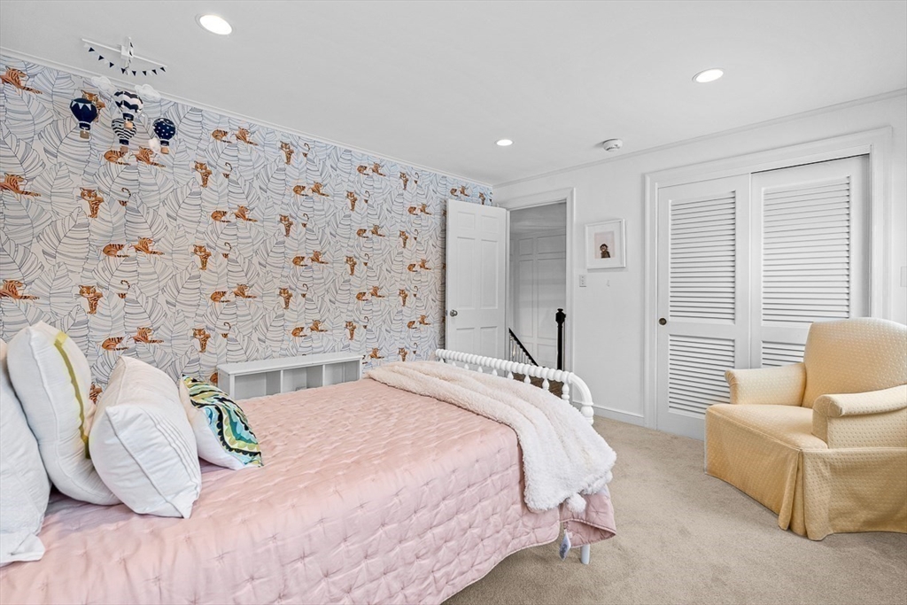 169 Hampshire Road Wellesley, MA 02481 - Photo 29 of 42 a bedroom with a bed and a couch
