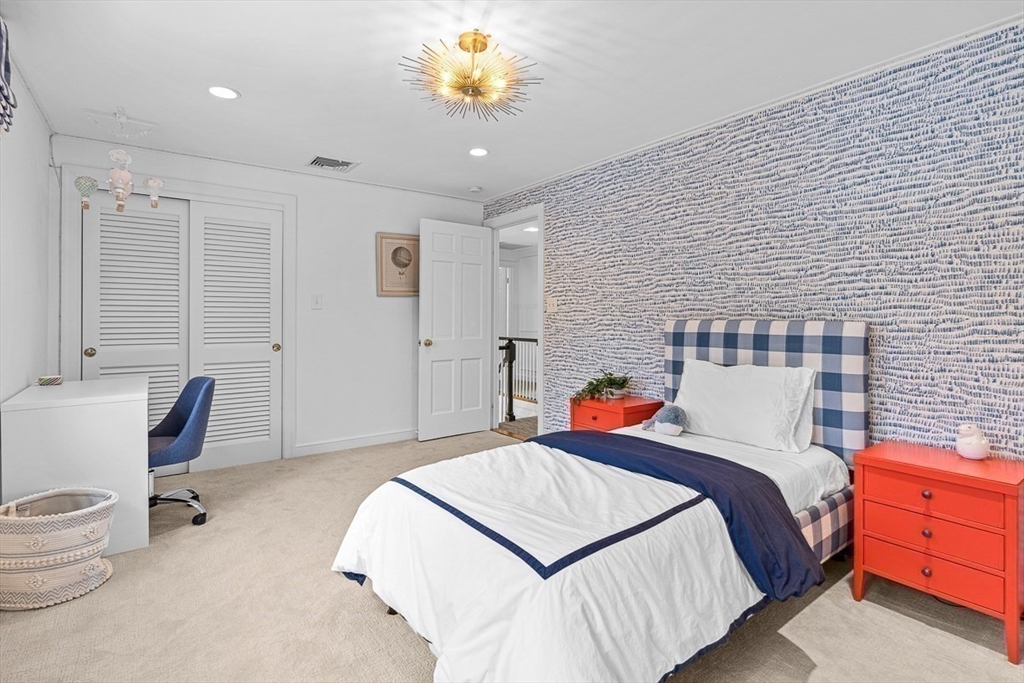 169 Hampshire Road Wellesley, MA 02481 - Photo 31 of 42 a bedroom with a bed and a dresser