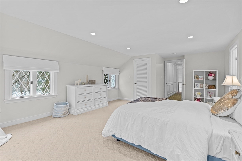 169 Hampshire Road Wellesley, MA 02481 - Photo 34 of 42 a spacious bedroom with a bed and a window