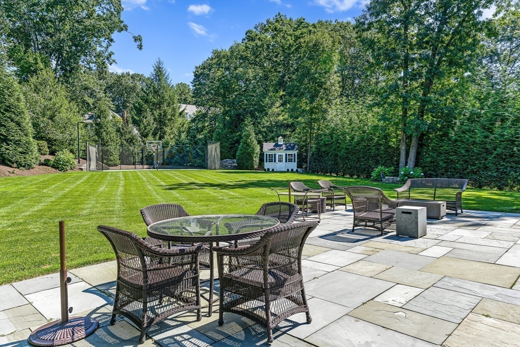 169 Hampshire Road Wellesley, MA 02481 - Photo 39 of 42 a view of a swimming pool and lounge chairs