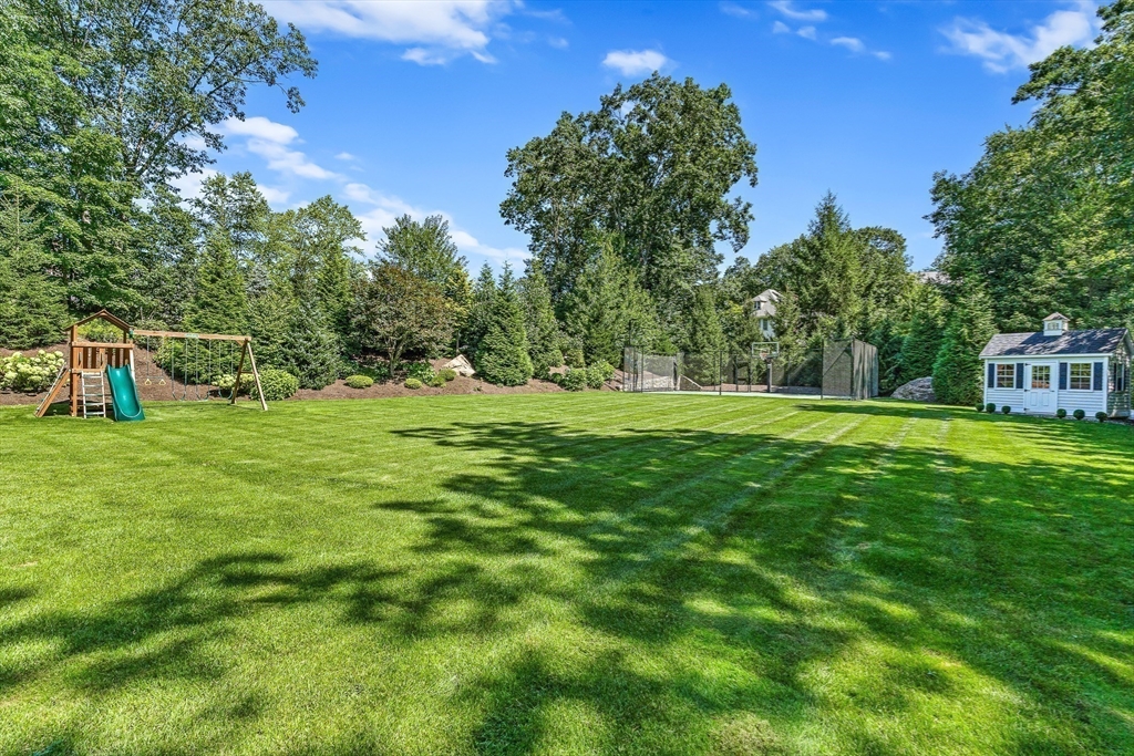 169 Hampshire Road Wellesley, MA 02481 - Photo 40 of 42 a view of green field with trees in the background