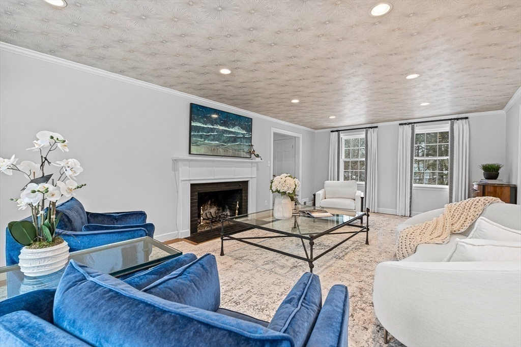 169 Hampshire Road Wellesley, MA 02481 - Photo 6 of 42 a living room with furniture and a fireplace