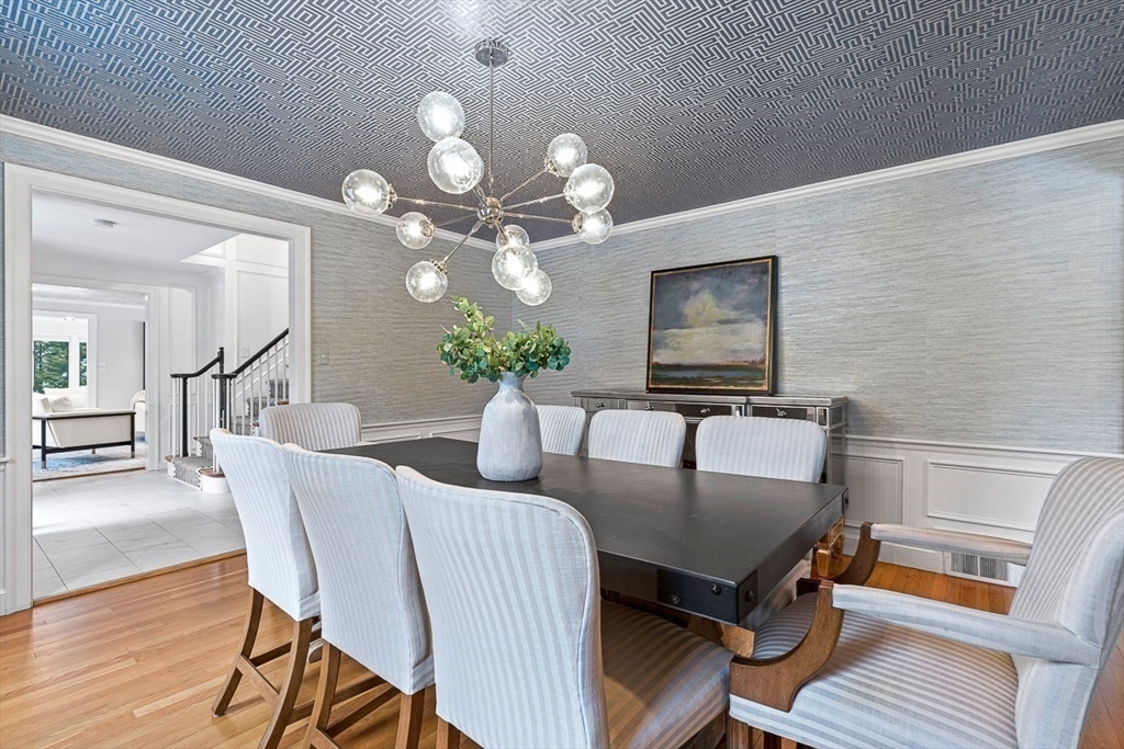 169 Hampshire Road Wellesley, MA 02481 - Photo 9 of 42 a view of a dining room with furniture and wooden floor