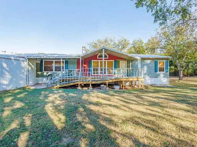 a view of a house with a swimming pool