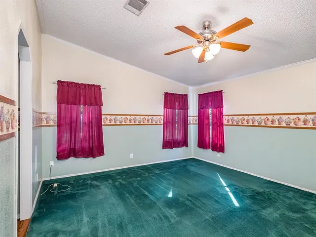 a view of bathroom with mirror
