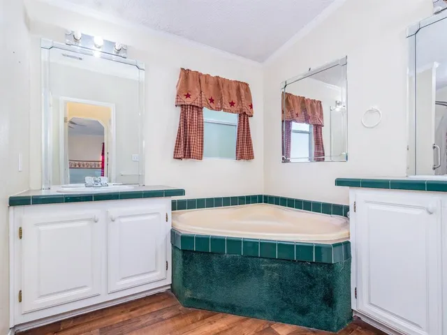 a view of a bathroom from the hallway