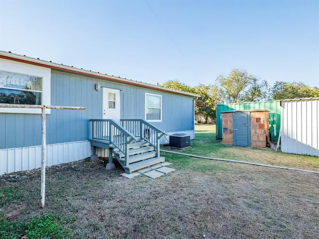 a view of yard with porch