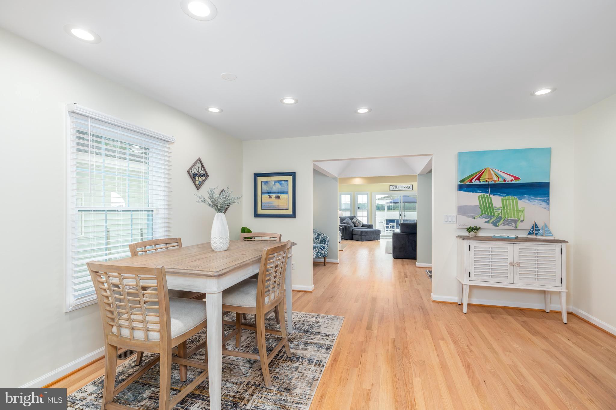 28016 Possum Point Road Millsboro, DE 19966 - Photo 20 of 70 a view of a dining room with furniture