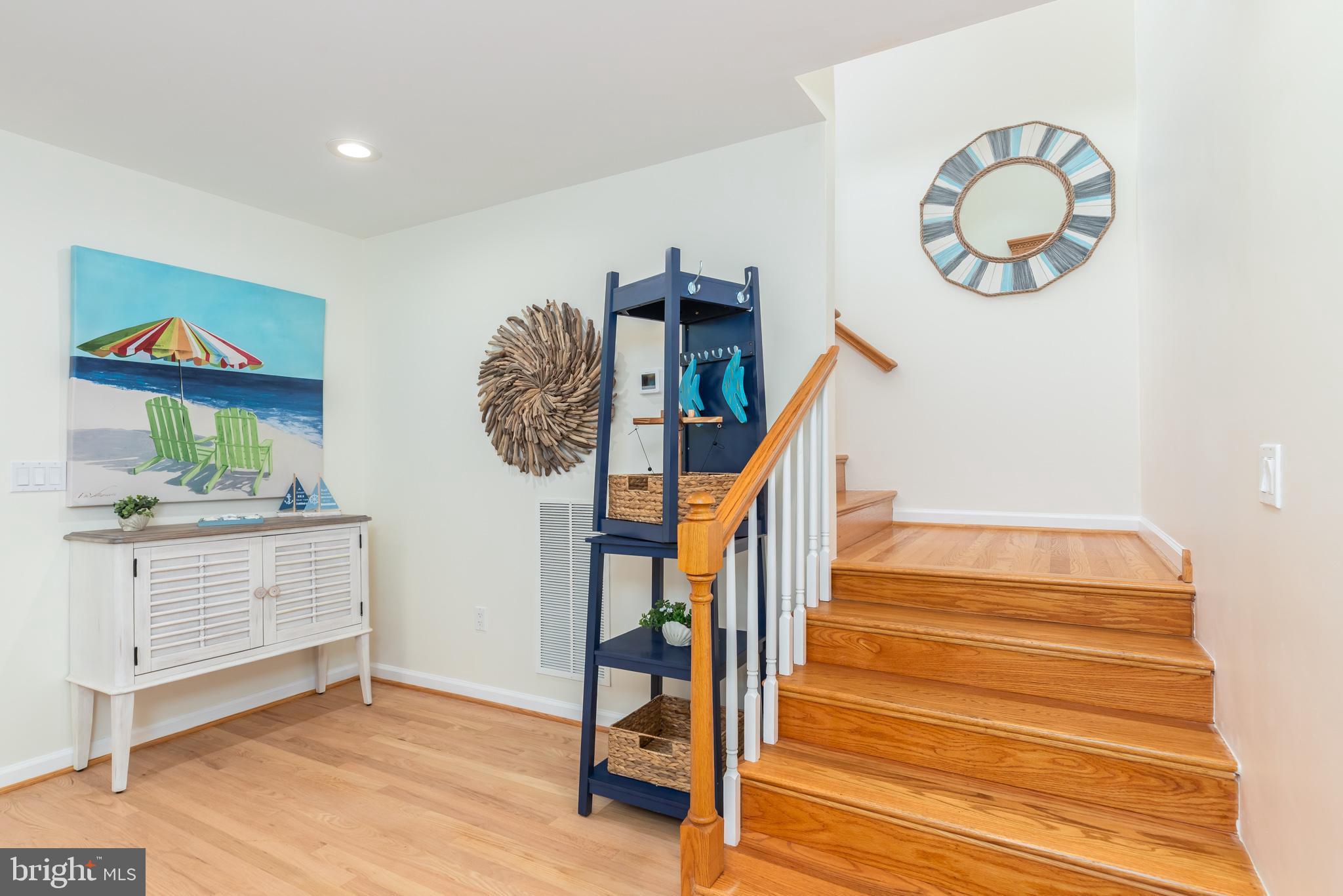 28016 Possum Point Road Millsboro, DE 19966 - Photo 27 of 70 a view of room with furniture and wooden floor