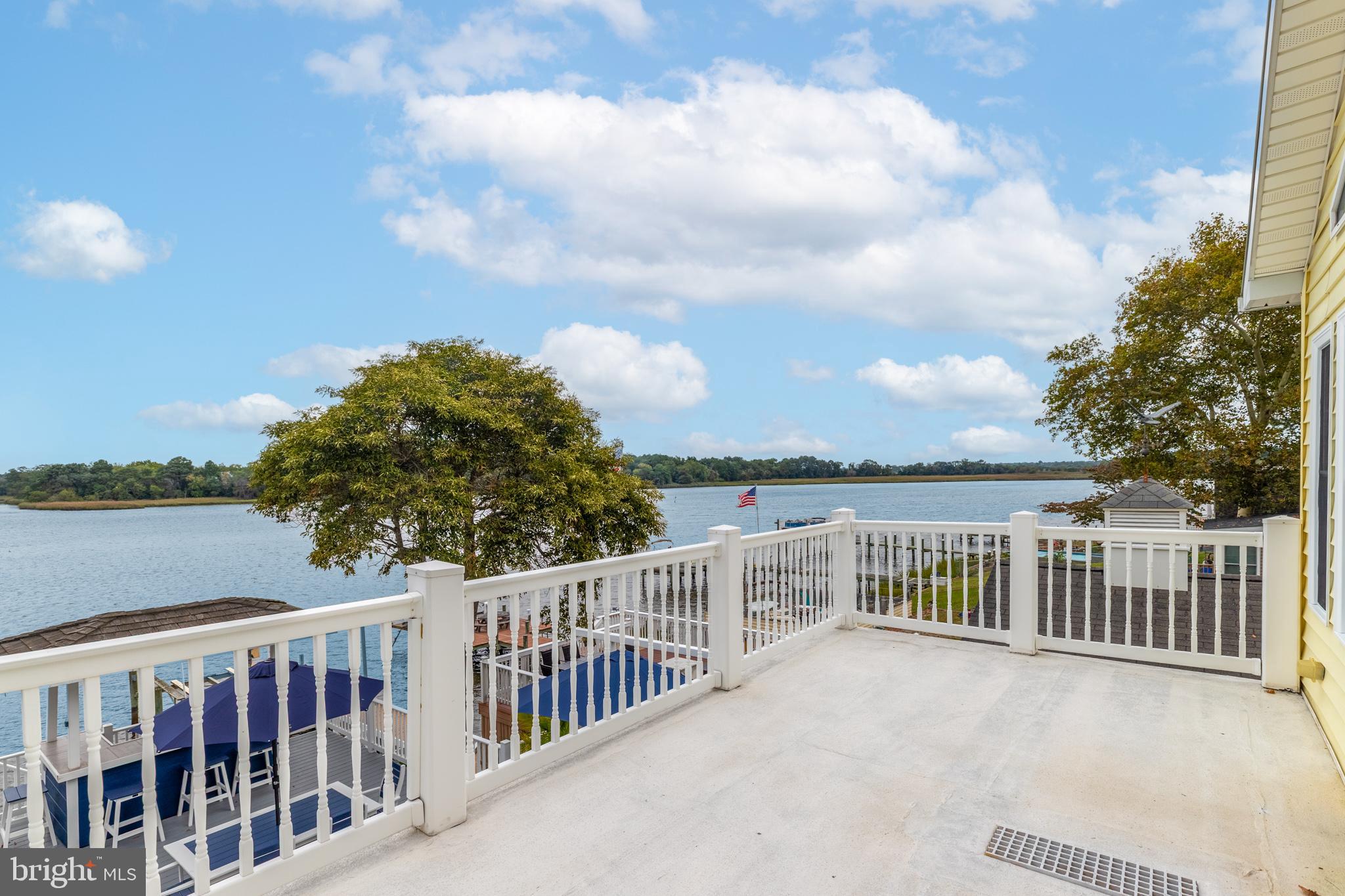 28016 Possum Point Road Millsboro, DE 19966 - Photo 33 of 70 a view of a city street from a balcony