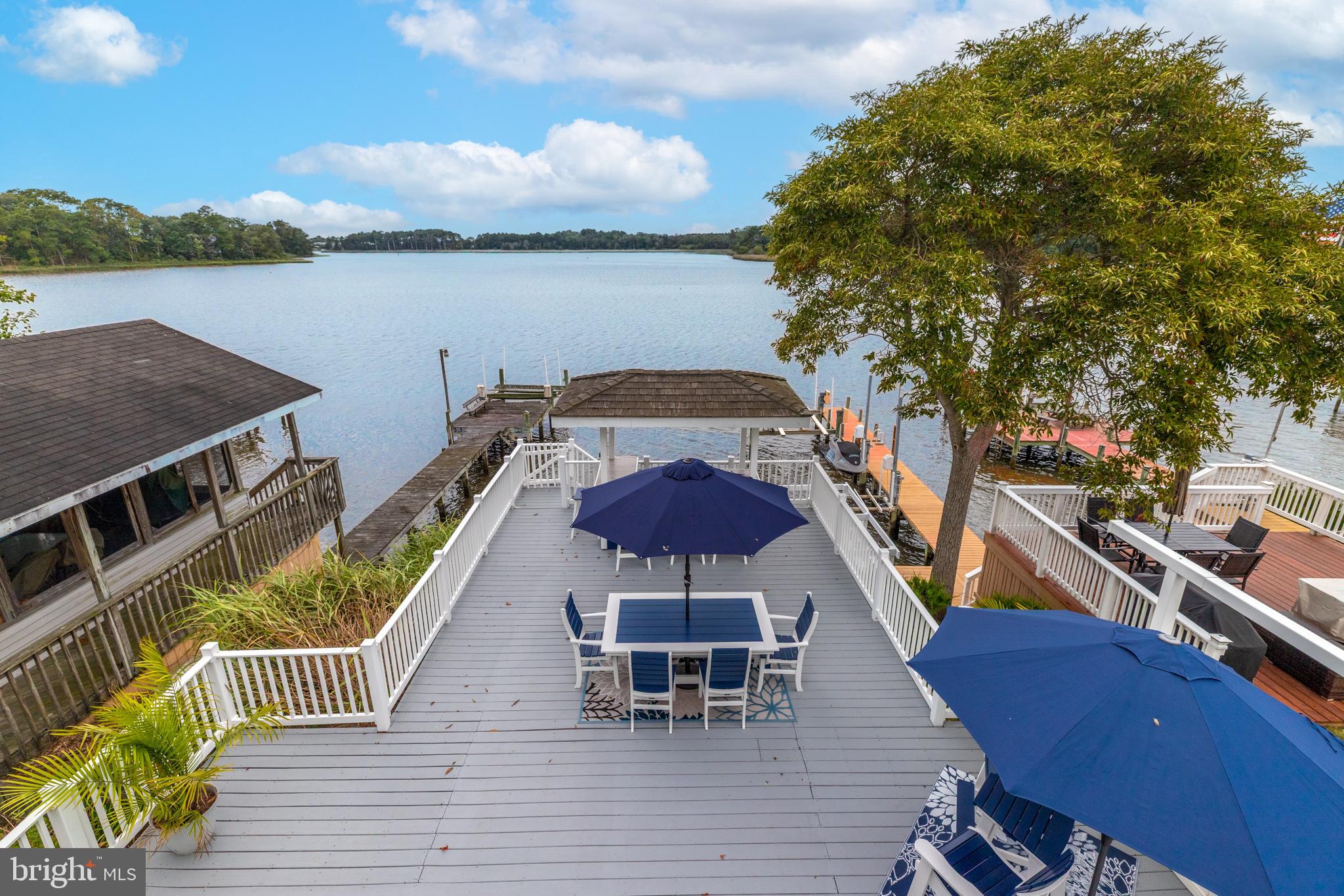 28016 Possum Point Road Millsboro, DE 19966 - Photo 34 of 70 a balcony view with a seating space
