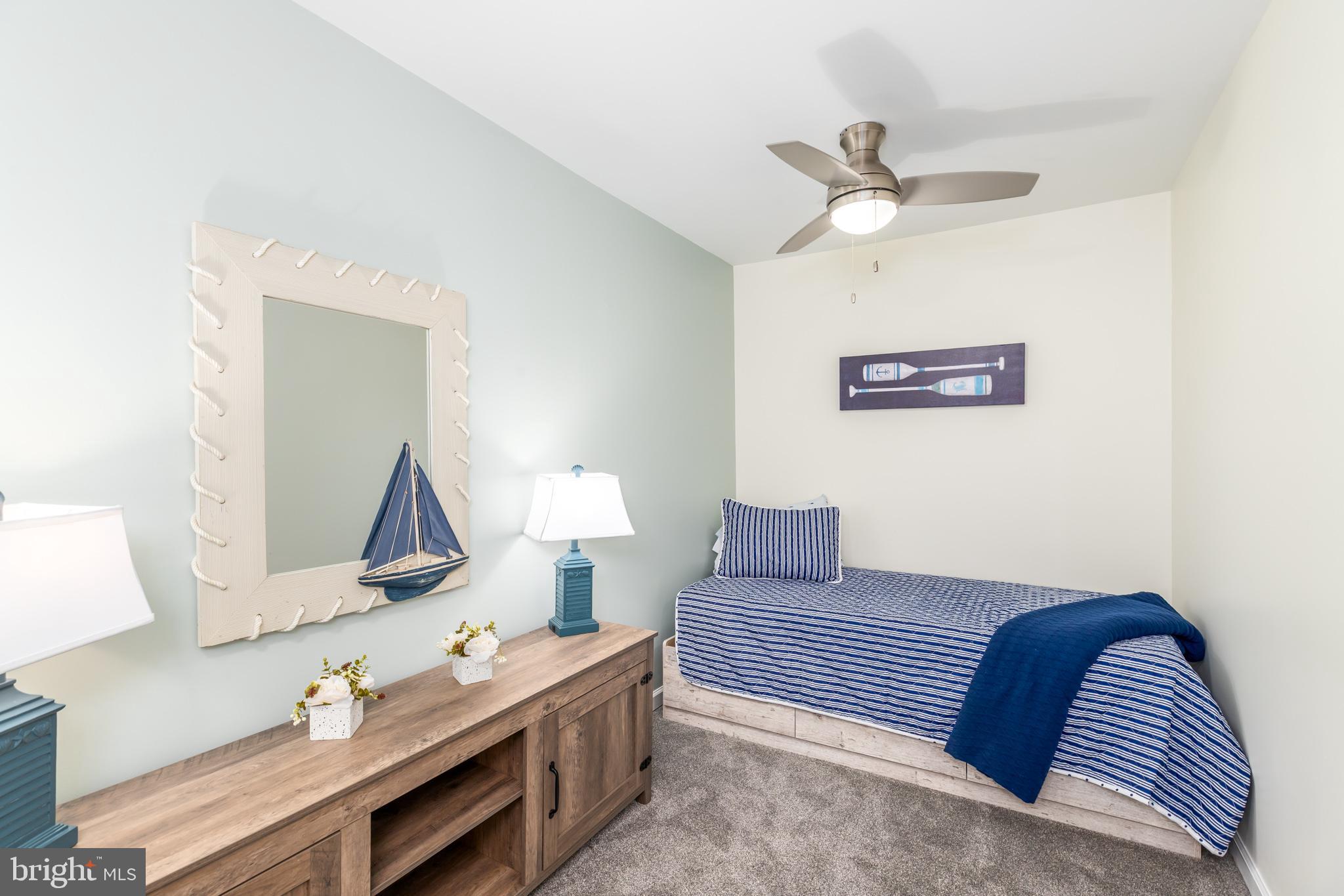 28016 Possum Point Road Millsboro, DE 19966 - Photo 40 of 70 a living room with furniture
