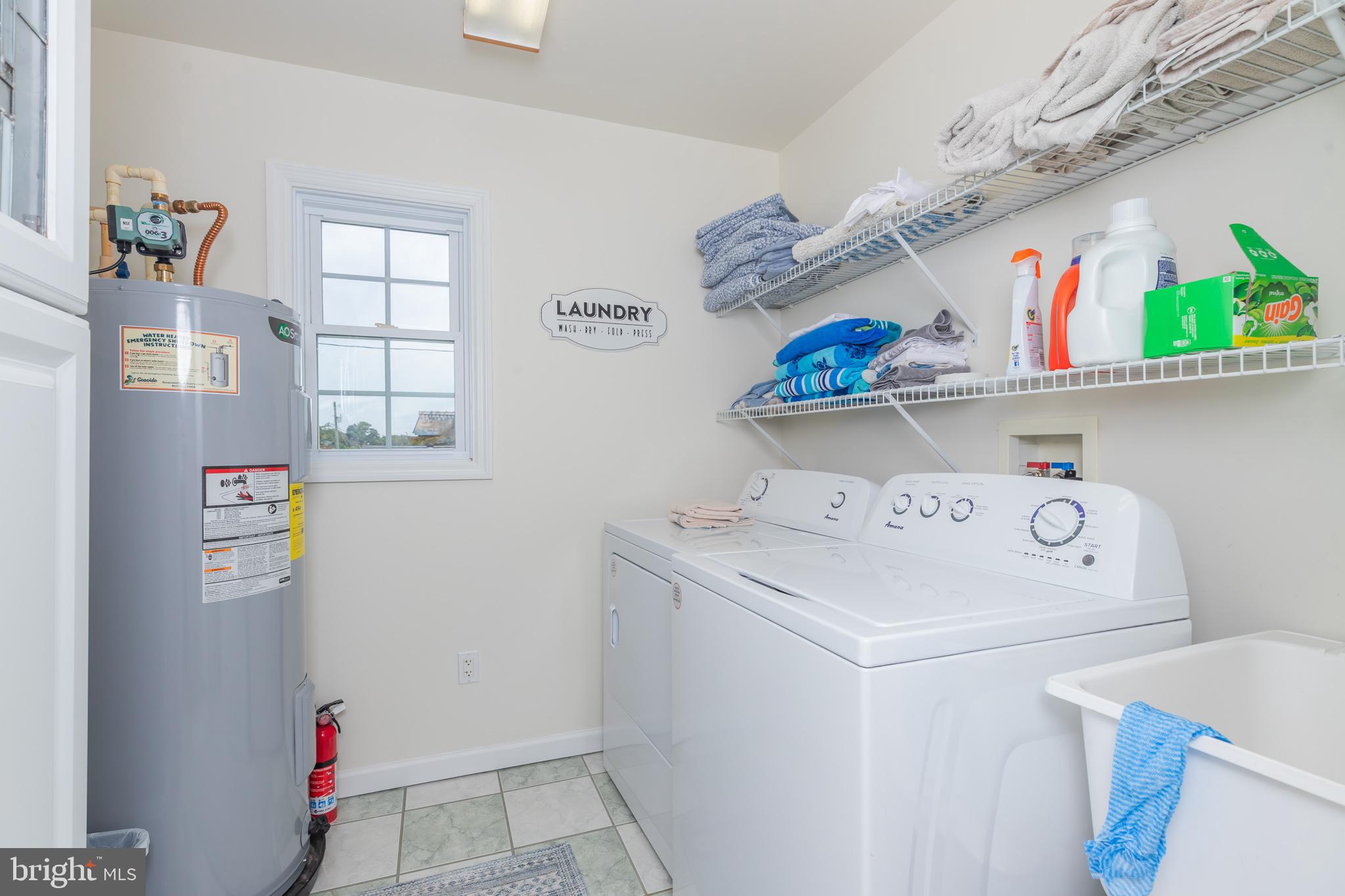 28016 Possum Point Road Millsboro, DE 19966 - Photo 48 of 70 a utility room with dryer and washer