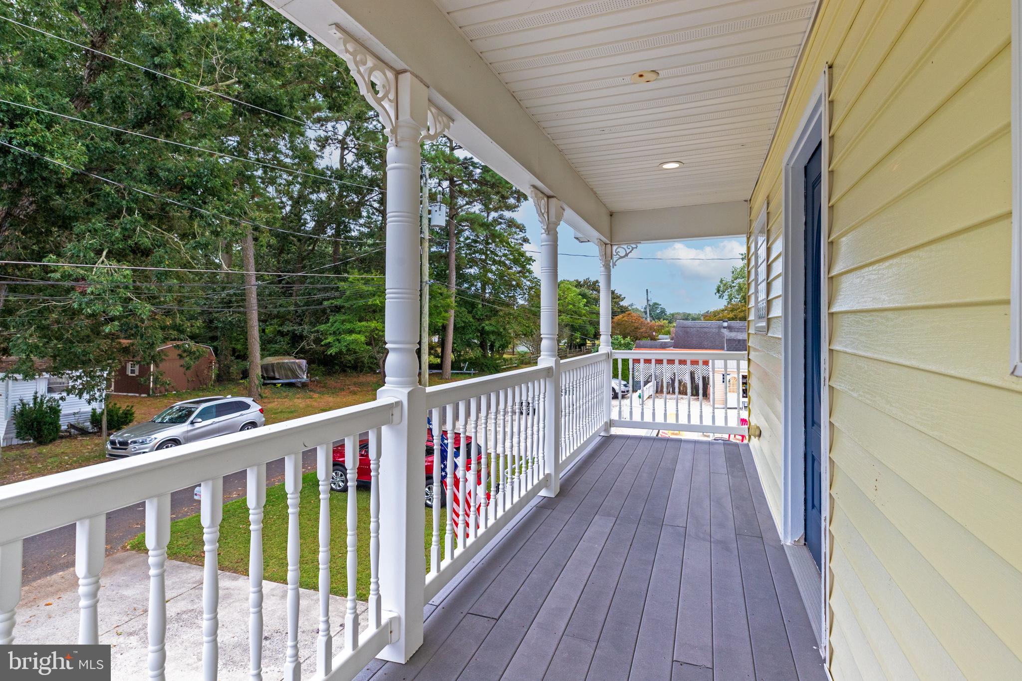 28016 Possum Point Road Millsboro, DE 19966 - Photo 51 of 70 a view of balcony with deck