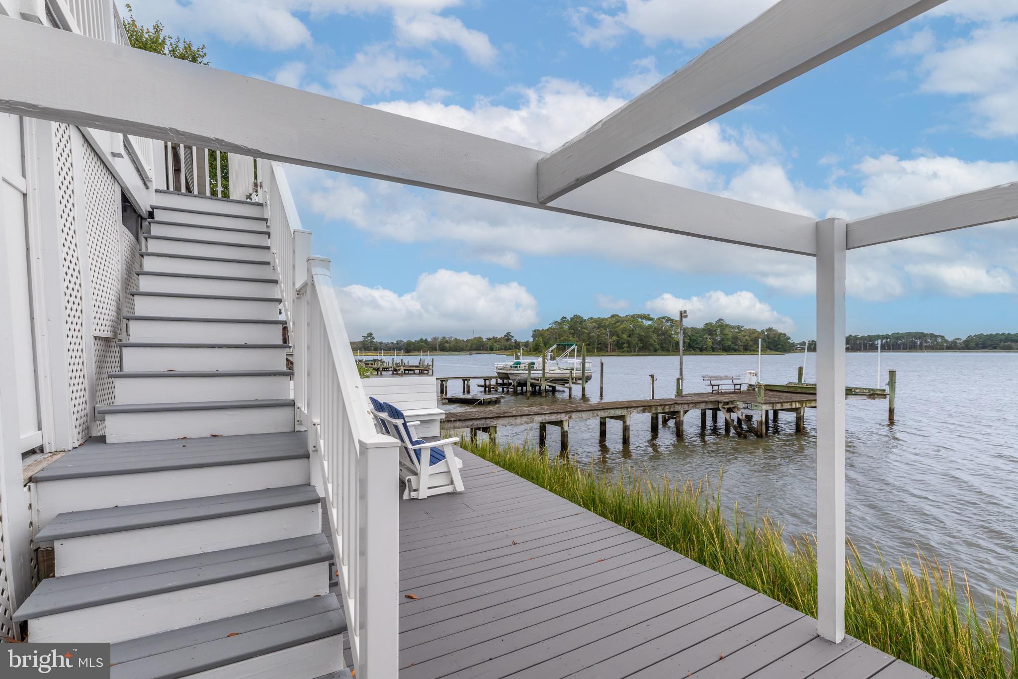28016 Possum Point Road Millsboro, DE 19966 - Photo 62 of 70 a view of balcony and deck with patio