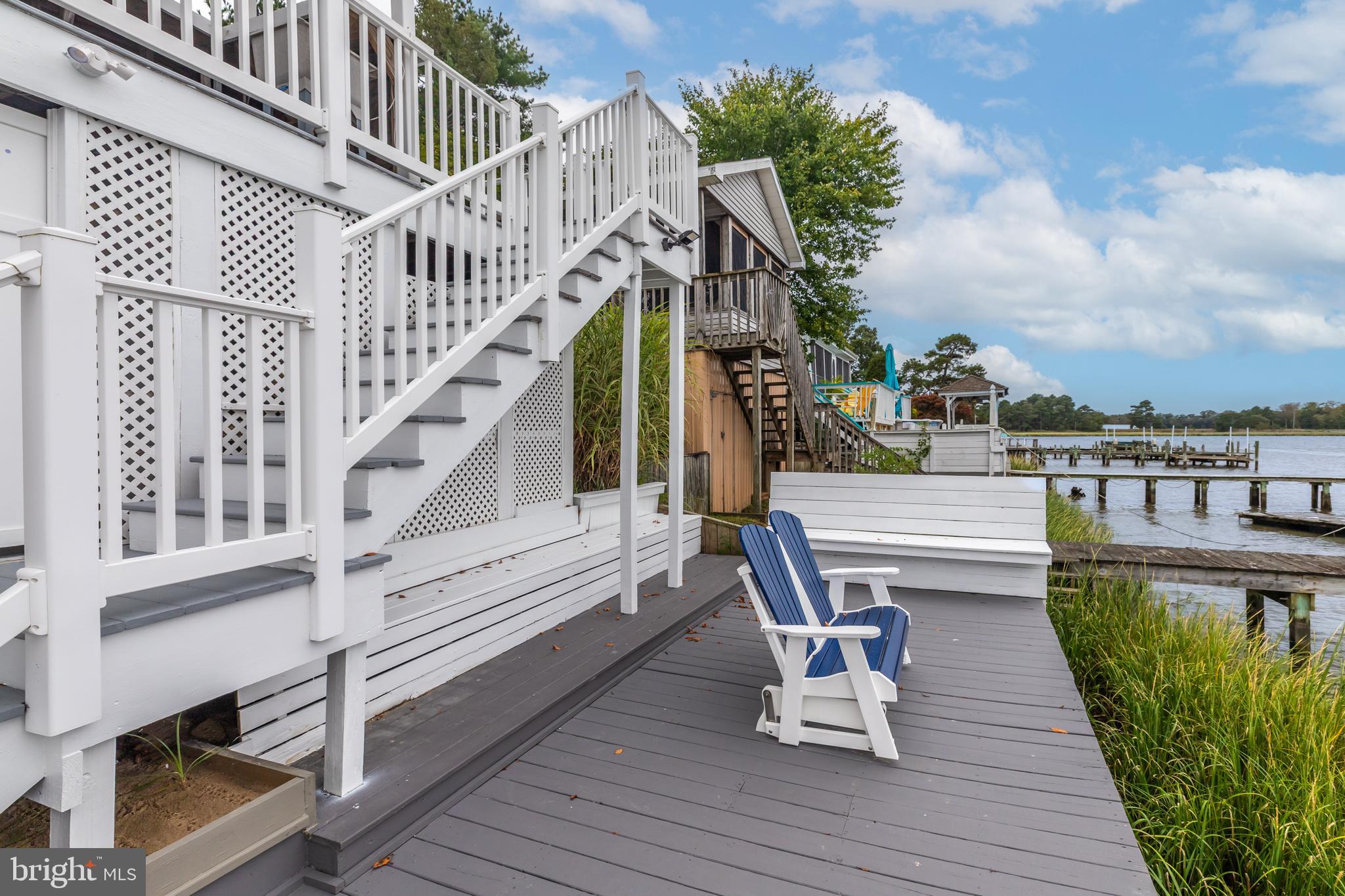 28016 Possum Point Road Millsboro, DE 19966 - Photo 63 of 70 a view of a chairs on the roof deck
