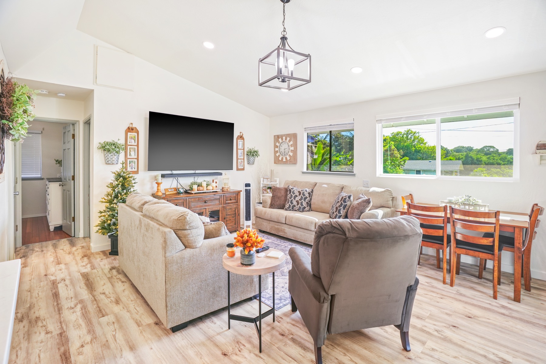 4940 A Hauaala Road Kapaa, HI 96746 - Photo 5 of 22 a living room with furniture a large window and a flat screen tv