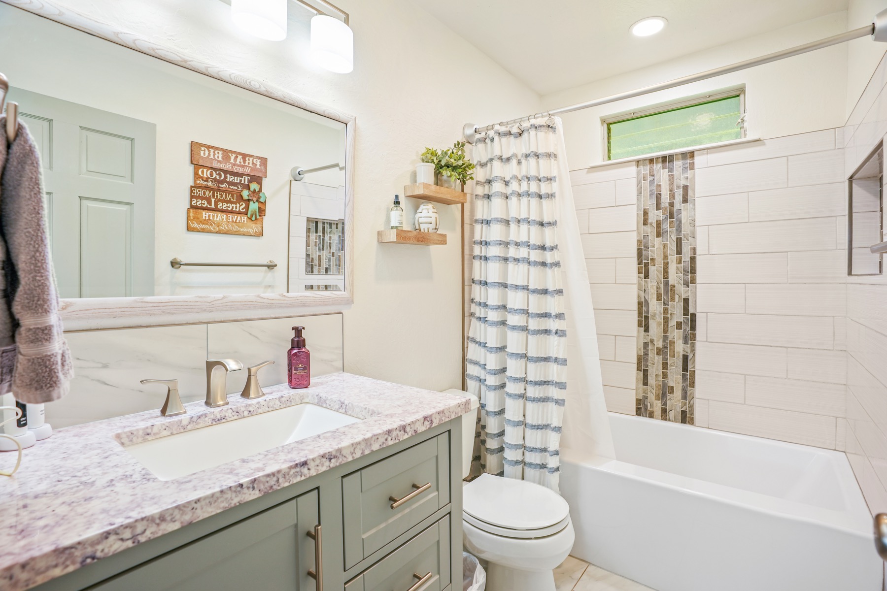 4940 A Hauaala Road Kapaa, HI 96746 - Photo 8 of 22 a bathroom with a granite countertop sink a toilet and shower