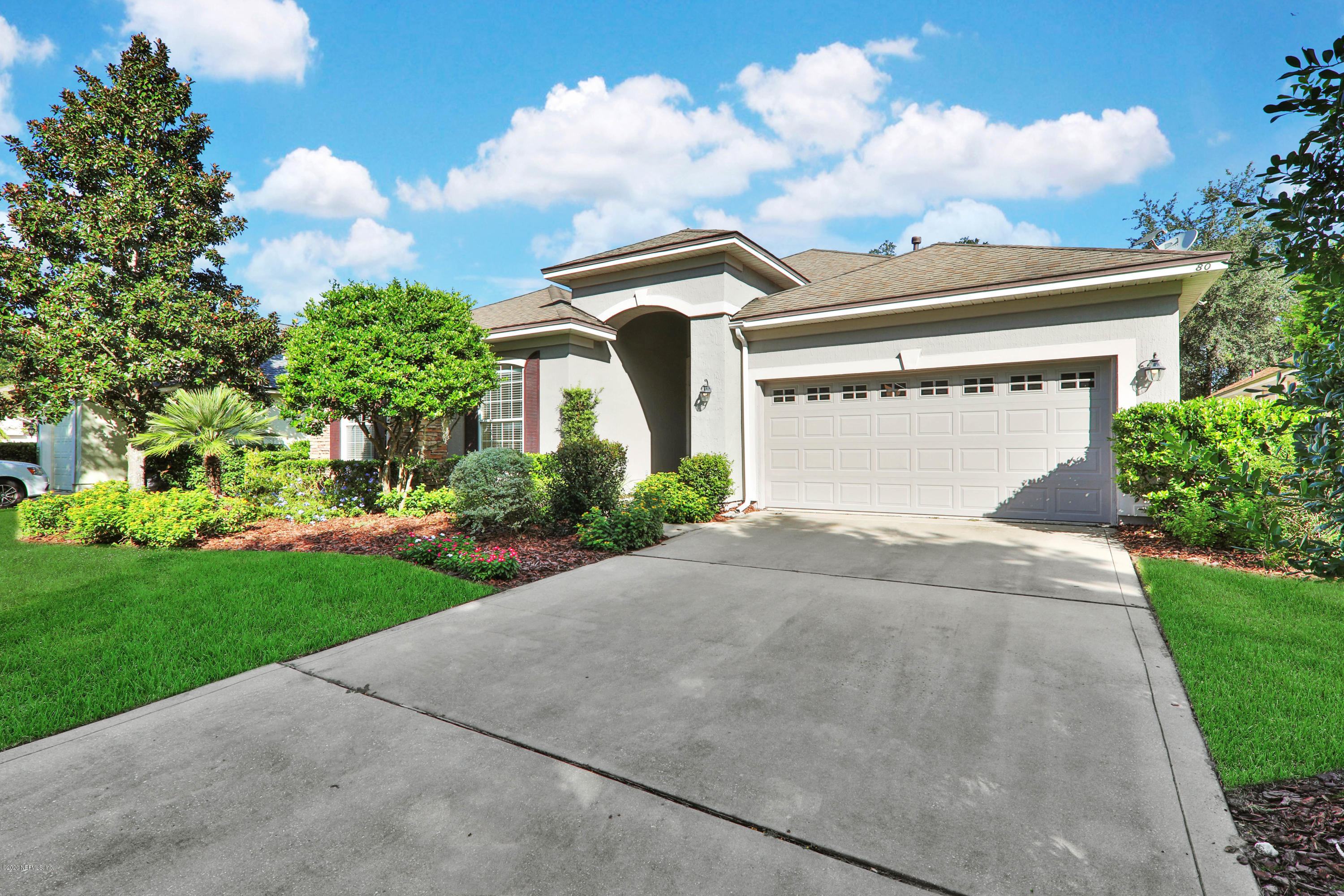 804 Riley Lane St. Augustine, FL 32095 - Photo 1 of 35 a front view of a house with a yard and garage