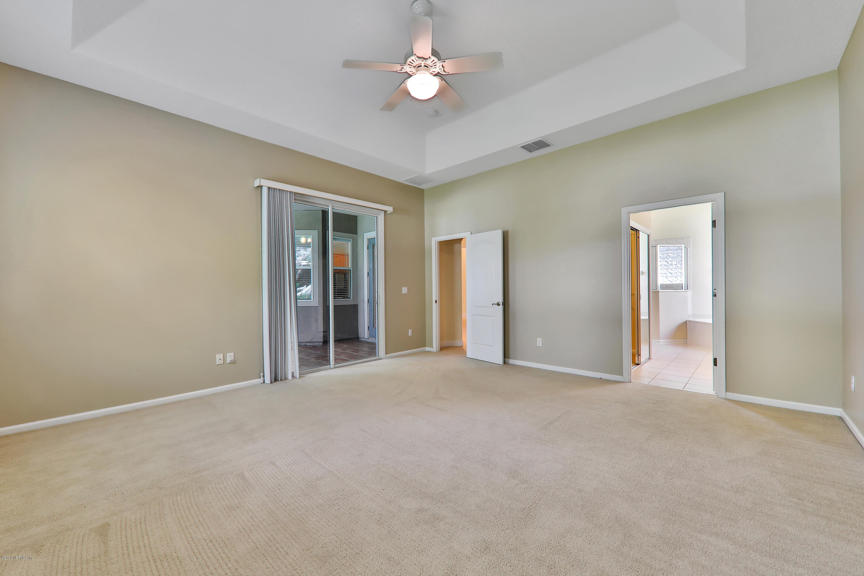 804 Riley Lane St. Augustine, FL 32095 - Photo 18 of 35 an empty room with fan and windows
