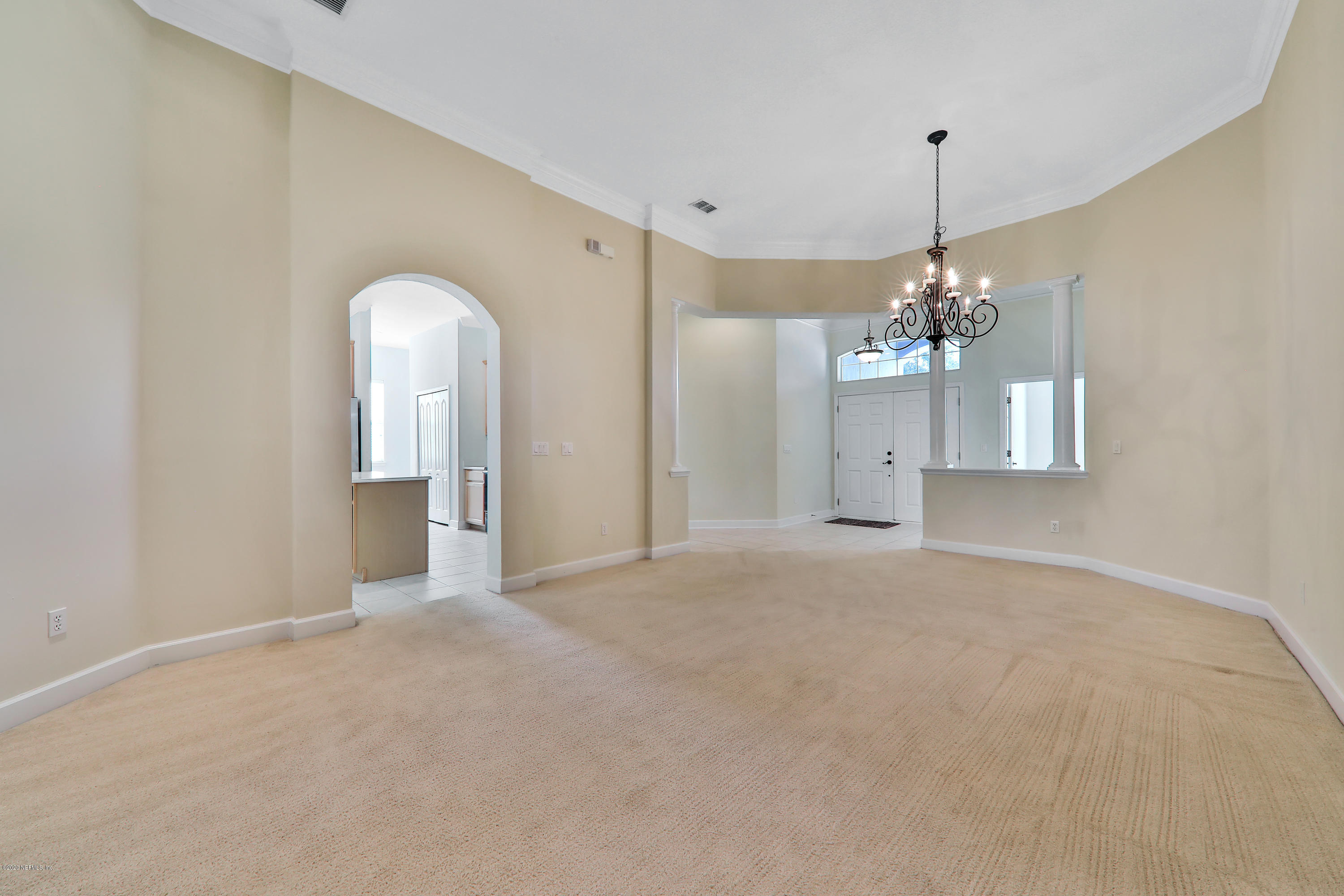804 Riley Lane St. Augustine, FL 32095 - Photo 22 of 35 a view of a kitchen with refrigerator and window