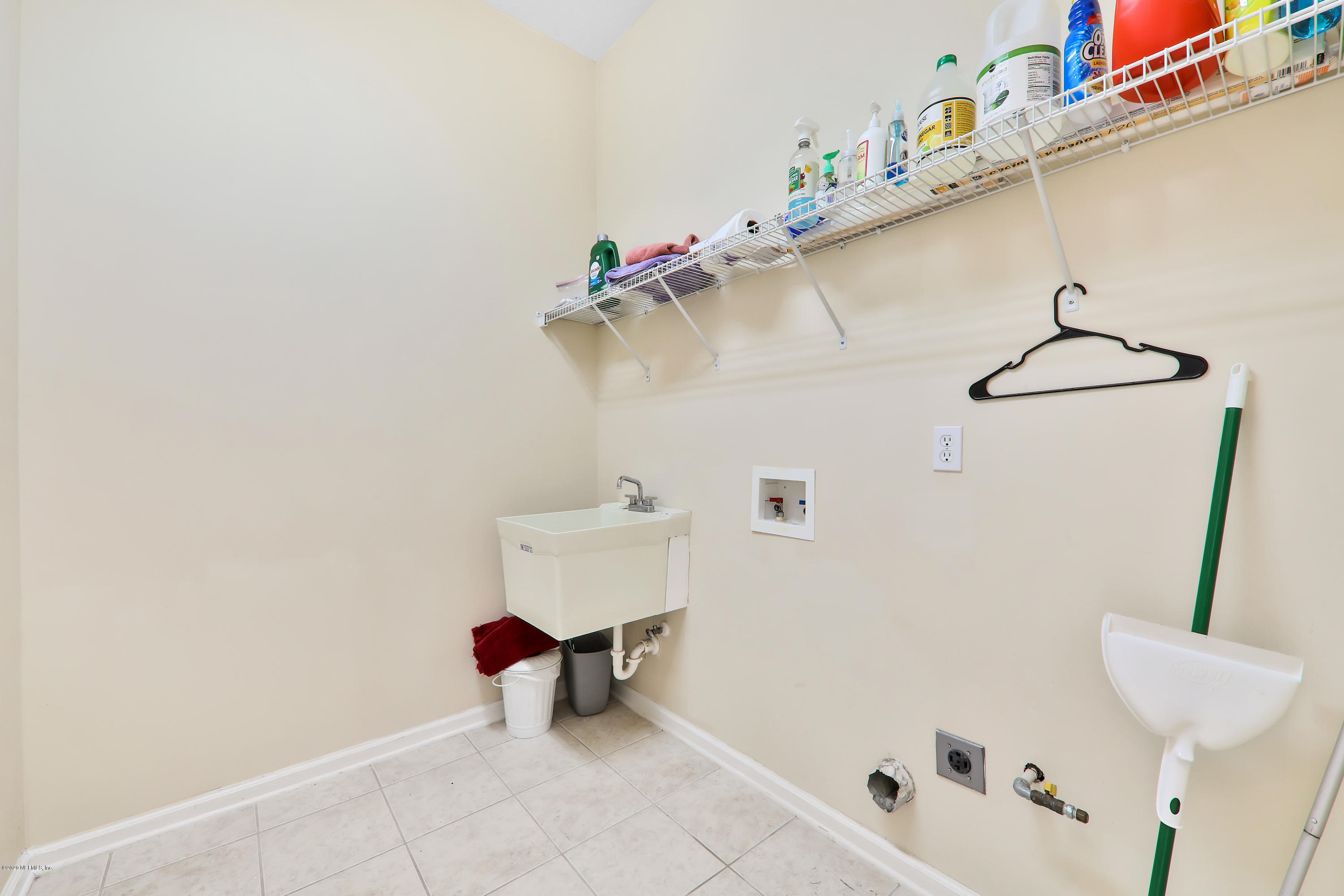 804 Riley Lane St. Augustine, FL 32095 - Photo 28 of 35 a bathroom with a sink and a mirror