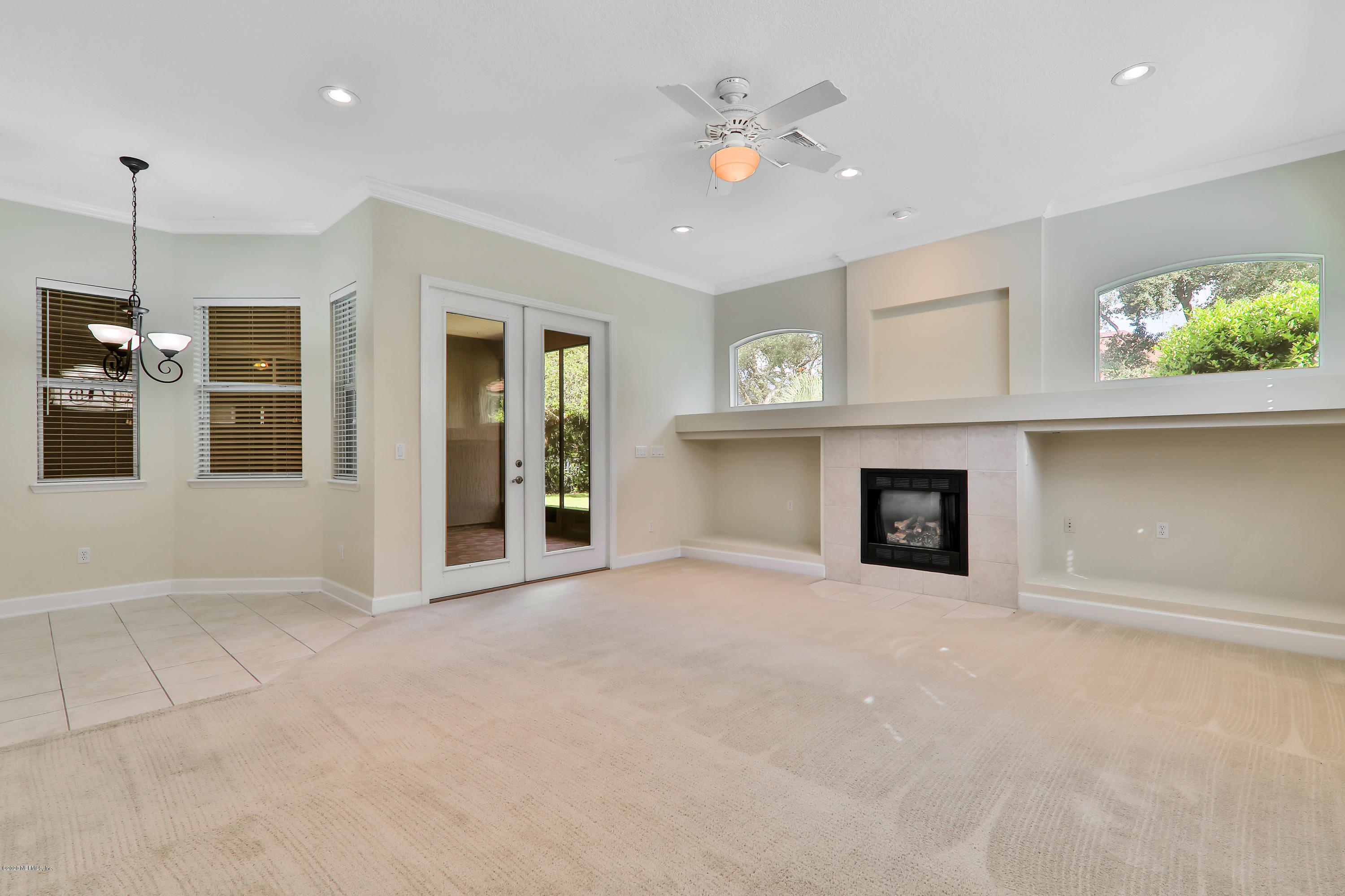 804 Riley Lane St. Augustine, FL 32095 - Photo 33 of 35 a view of an empty room with a fireplace and a window