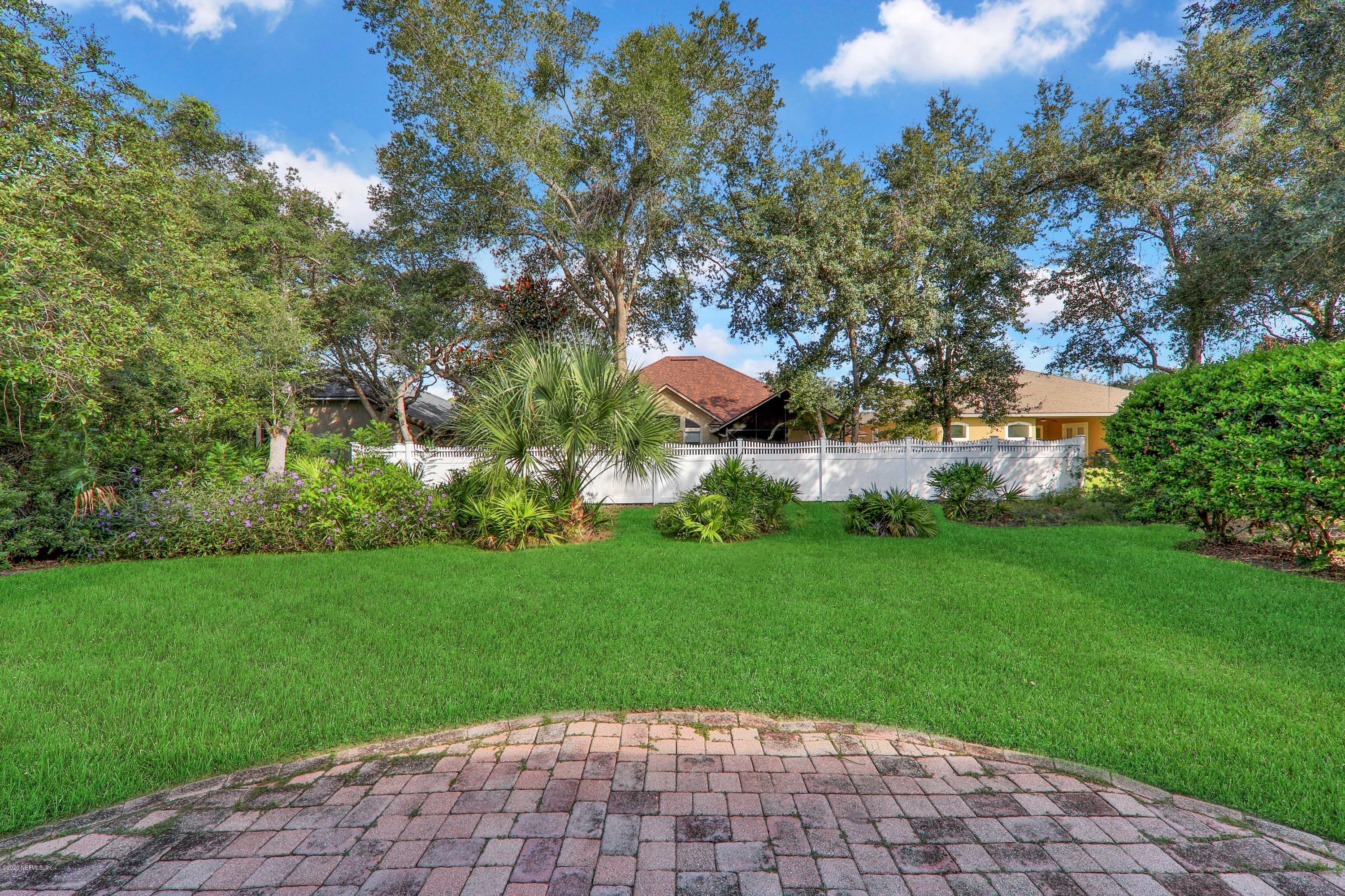 804 Riley Lane St. Augustine, FL 32095 - Photo 6 of 35 a backyard of a house with lots of green space