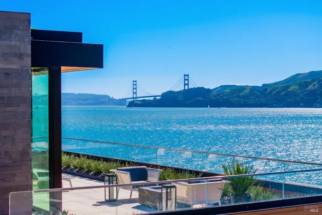 a view of a bathroom with a tub and shower