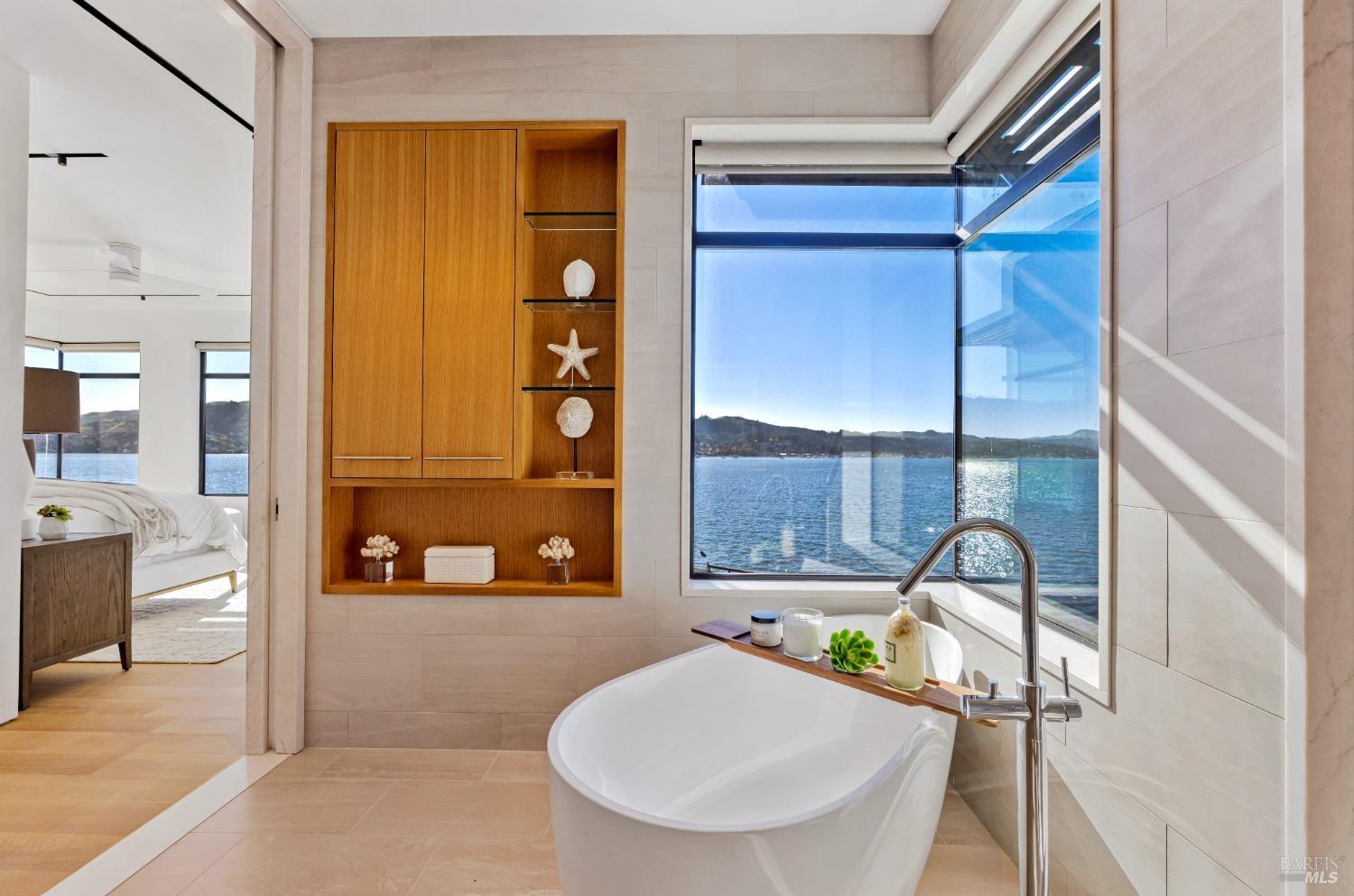 46 Cliff Road Belvedere, CA 94920 - Photo 34 of 42 a bathroom with a sink and a mirror