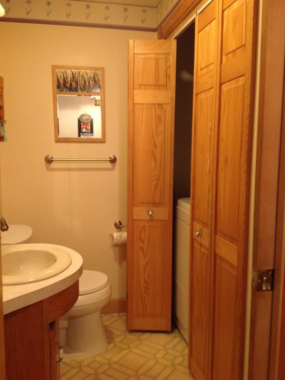 834 China Road Winslow, ME 04901 - Photo 11 of 35 Downstairs half bath with laundry in...