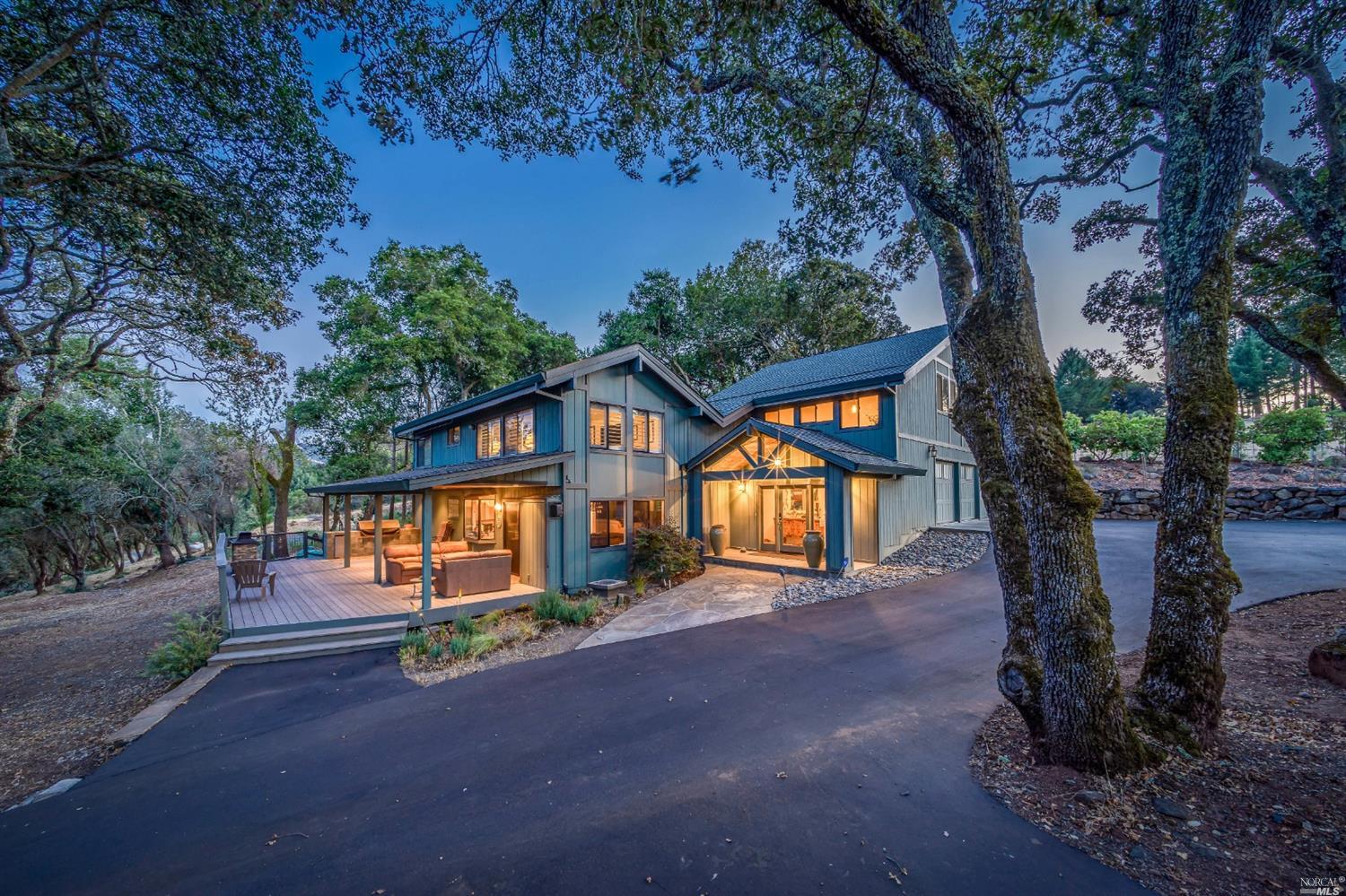 2898 Rollo Road Santa Rosa, CA 95404 - Photo 1 of 1 a front view of a house with garden and trees